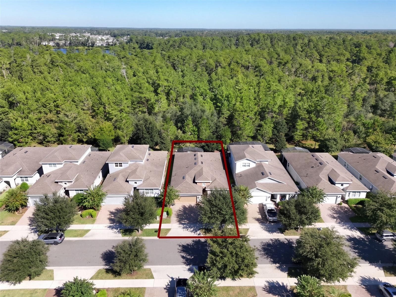 Aerial view of Home's location w/ a wooded view - 1233 EGGLESTON DRIVE, DELAND