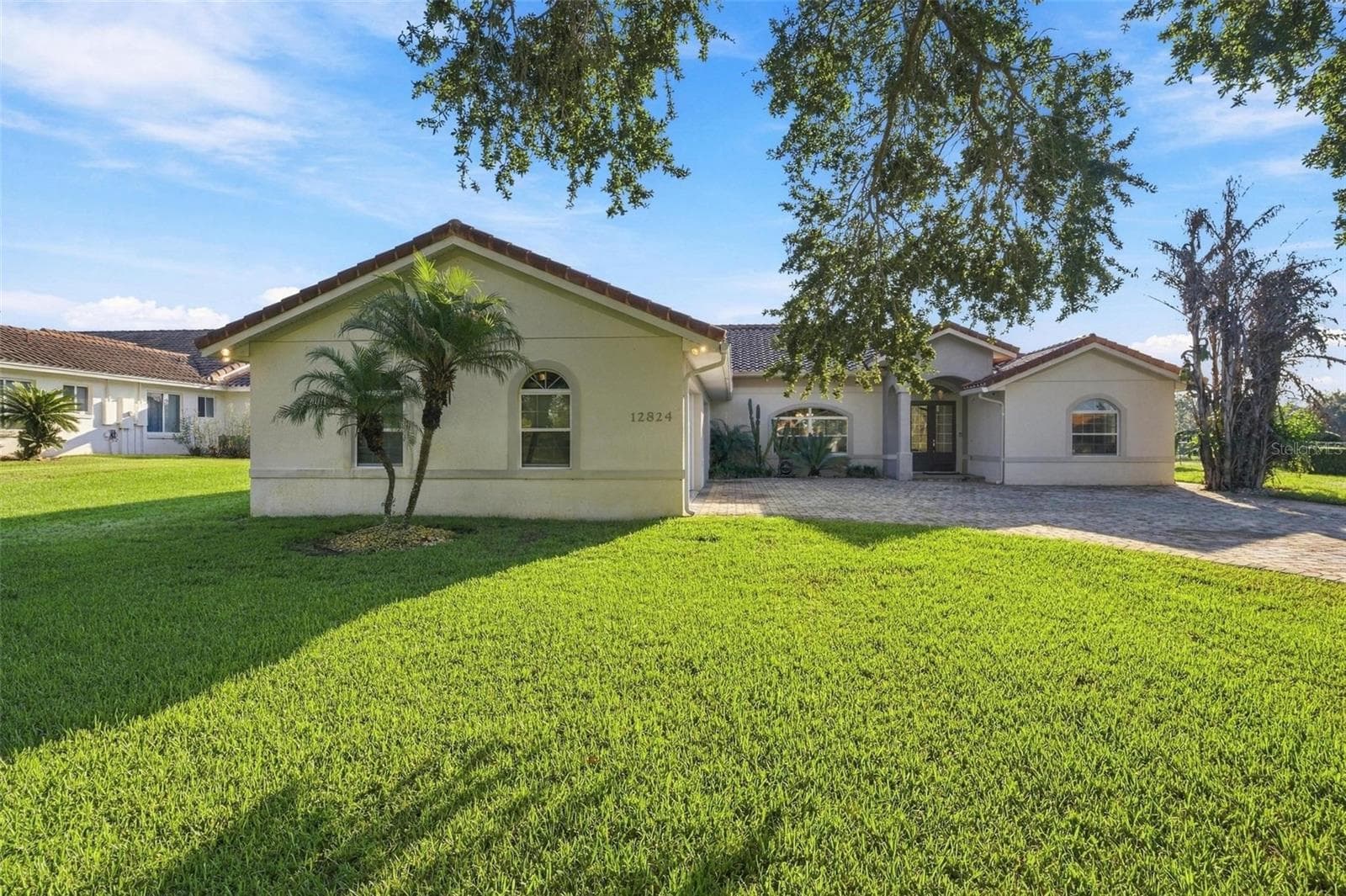 Front Side - 12824 BELLERIVE DR, CLERMONT