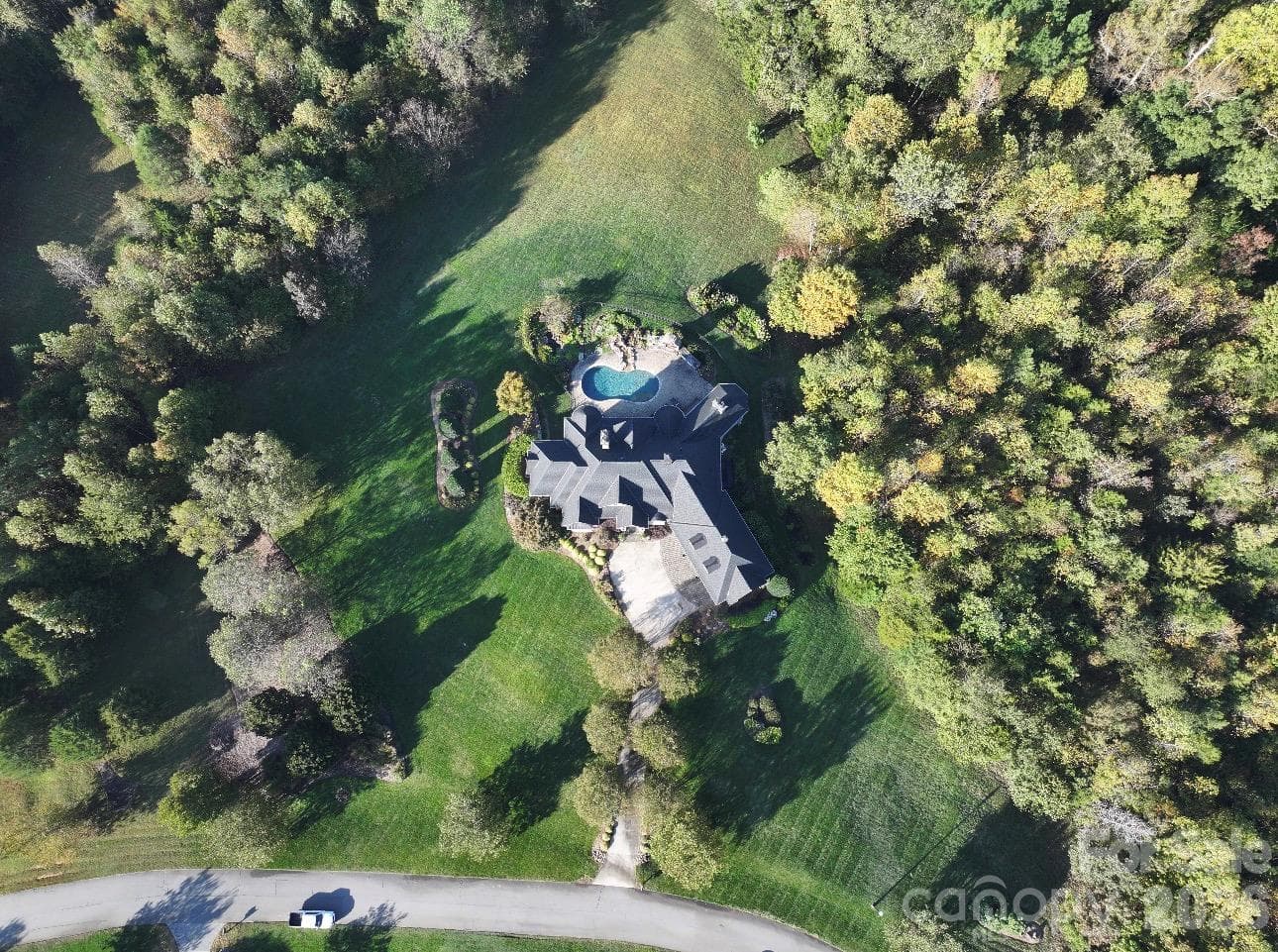 4.96 acres includes land past the wooded tree line to the left of the property - 973 Pinnacle Drive, Iron Station