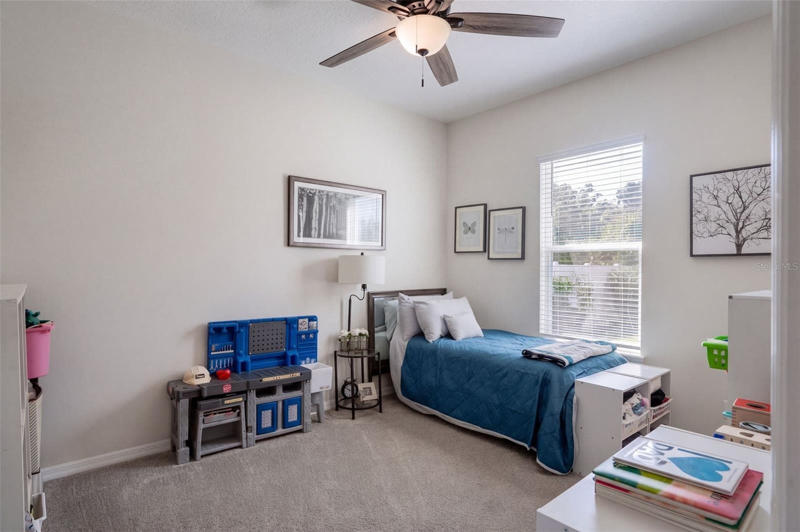 1st fl guest bedroom with a private en-suite bathroom - 4773 RIVERWALK DR, ST CLOUD