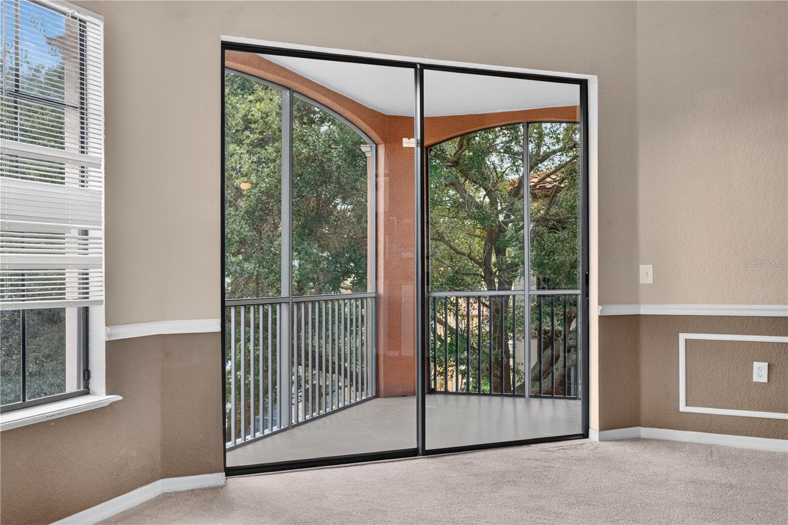 Sliding door going to the balcony - 6149 METROWEST BLVD #308, ORLANDO