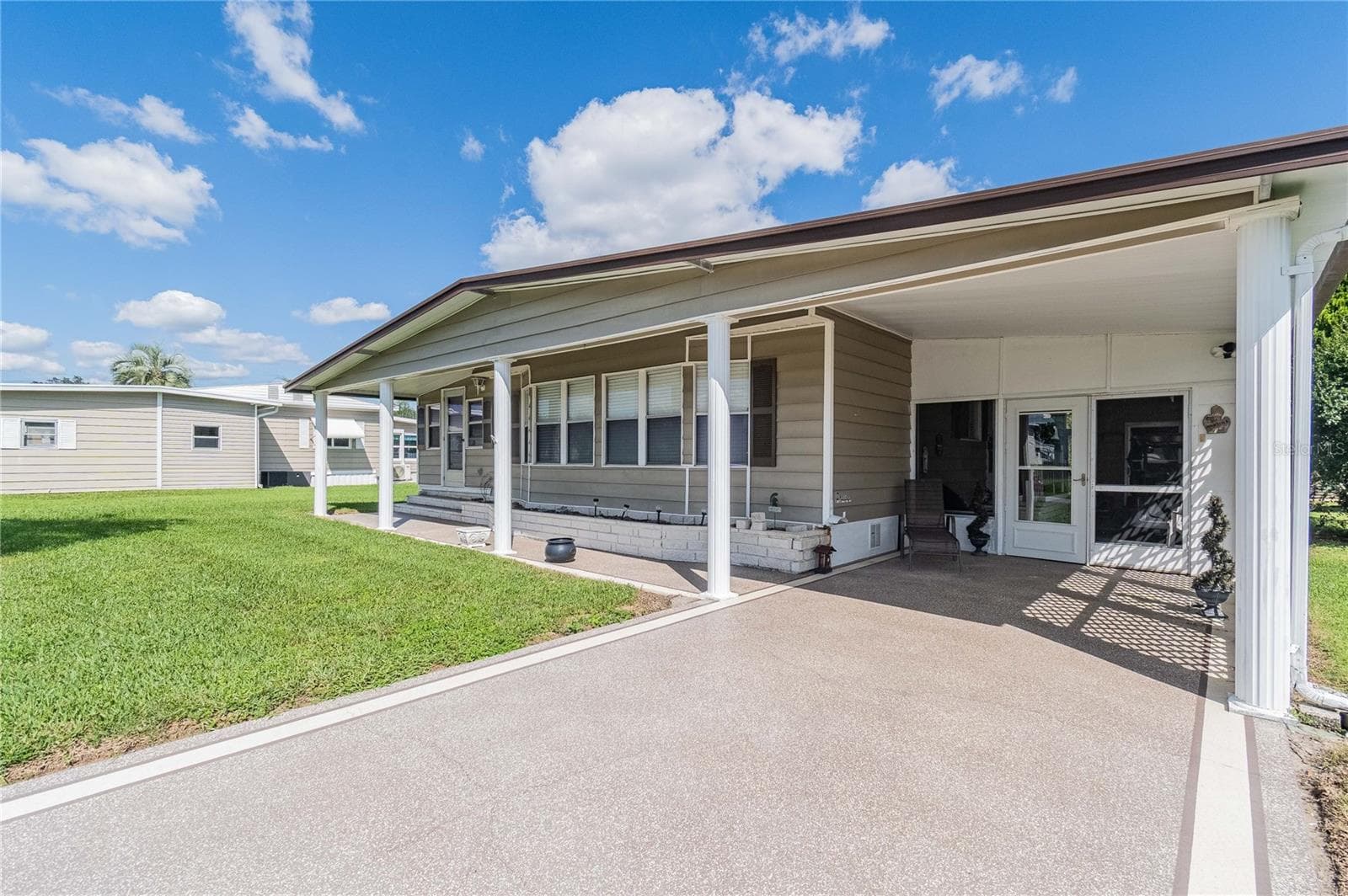 Manufactured Home at 5600 ARROWHEAD DR, ZEPHYRHILLS, photo 2 of 49