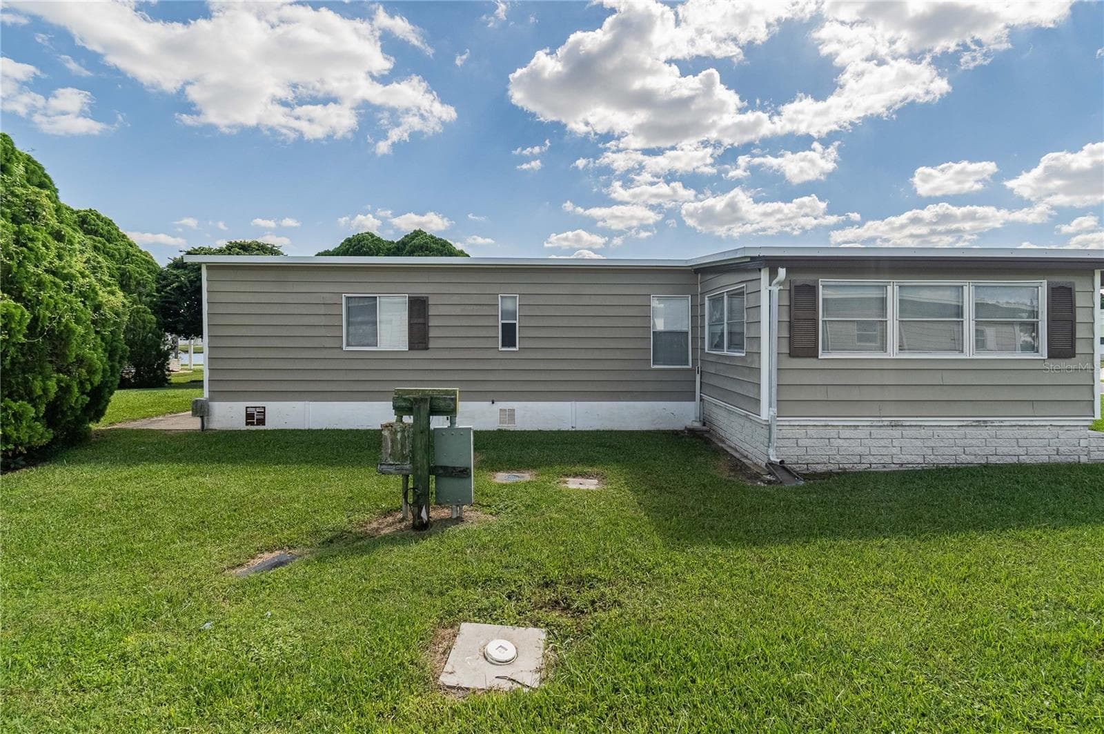 Manufactured Home at 5600 ARROWHEAD DR, ZEPHYRHILLS, photo 4 of 49