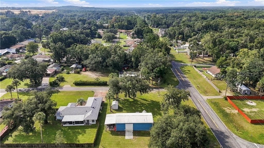 Neighborhood Aerial View – Wide aerial perspective capturing the surrounding neighborhood, tree-lined streets & established residential setting. - 6230 W GLEN ROBBIN CT, CRYSTAL RIVER
