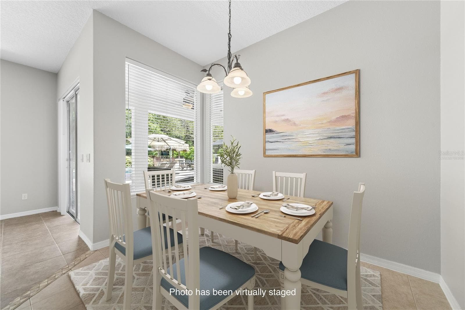 Here is the quaint breakfast nook or if you prefer a dinette for your family or smaller gatherings (photo virtually staged). - 16169 BRISTOL LAKE CIR, ORLANDO