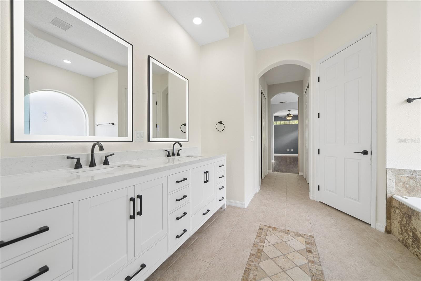 Walk past the two walk-in closets and into your primary bathroom with a water closet for your privacy. - 16169 BRISTOL LAKE CIR, ORLANDO