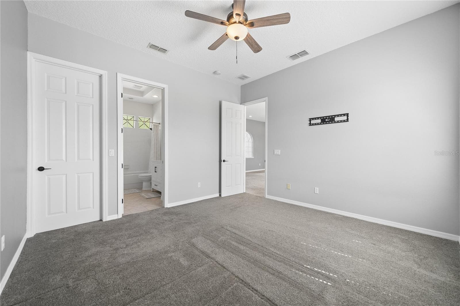 Bedroom two showing ensuite and closet door on the left. - 16169 BRISTOL LAKE CIR, ORLANDO