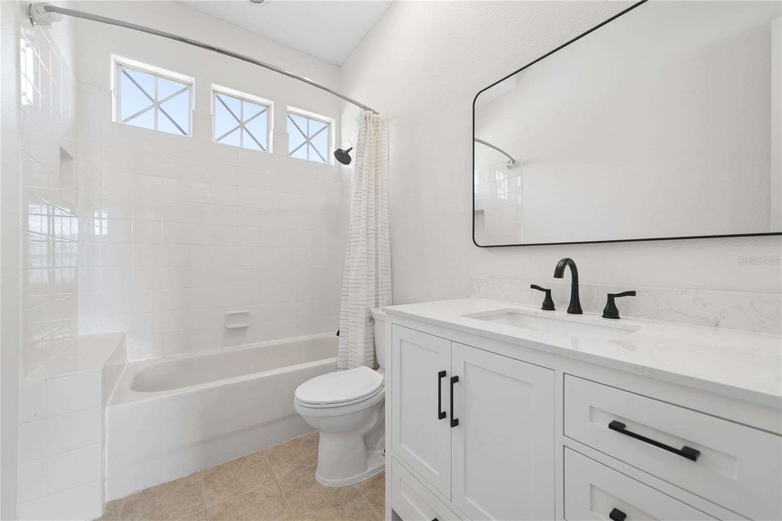 The ensuite for bedroom 2 with it's own linen closet (not shown) and a full 4 piece ensemble. - 16169 BRISTOL LAKE CIR, ORLANDO