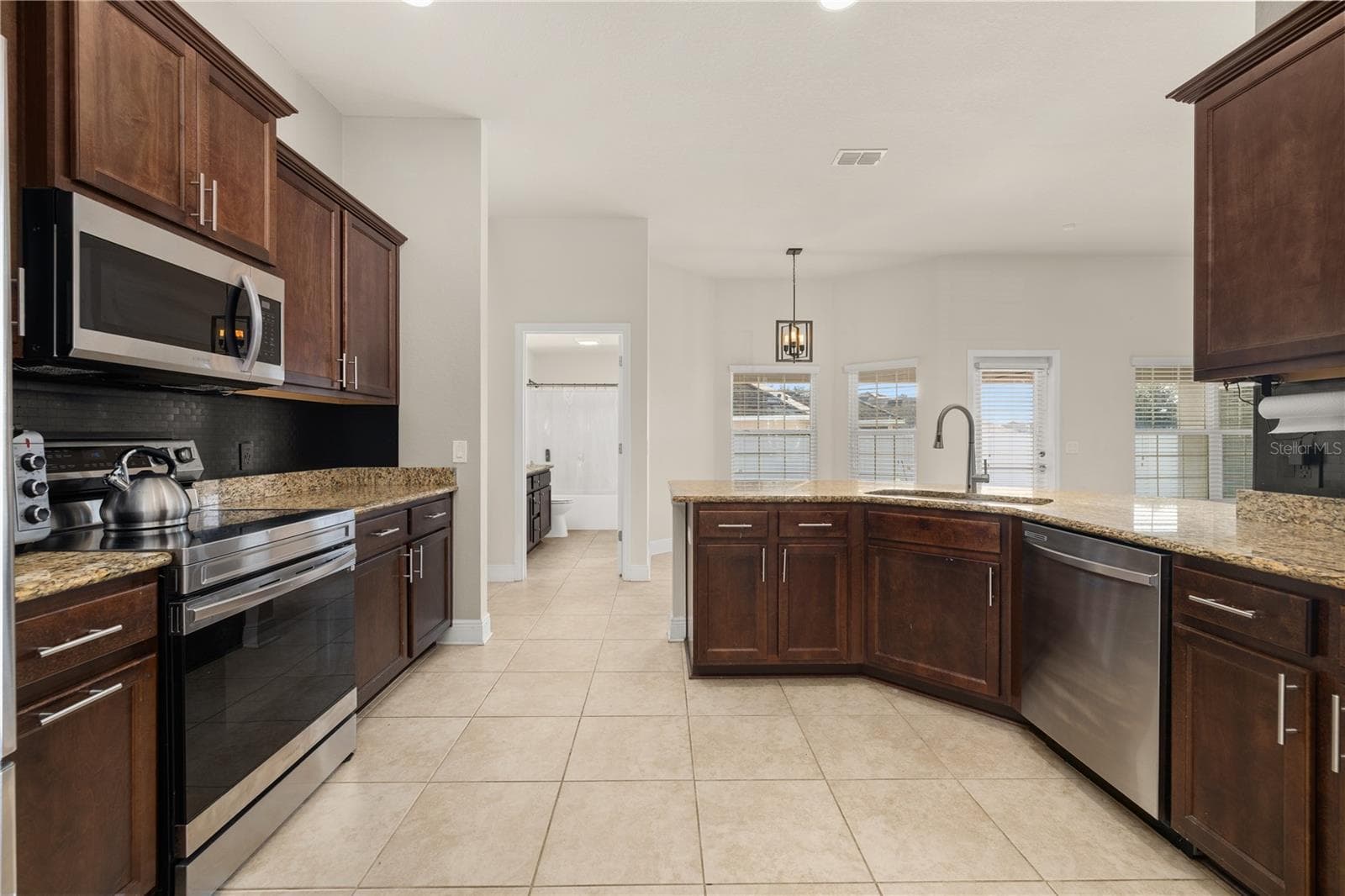 Single Family Residence at 702 COUNTRY WALK CV, EAGLE LAKE, photo 12 of 50