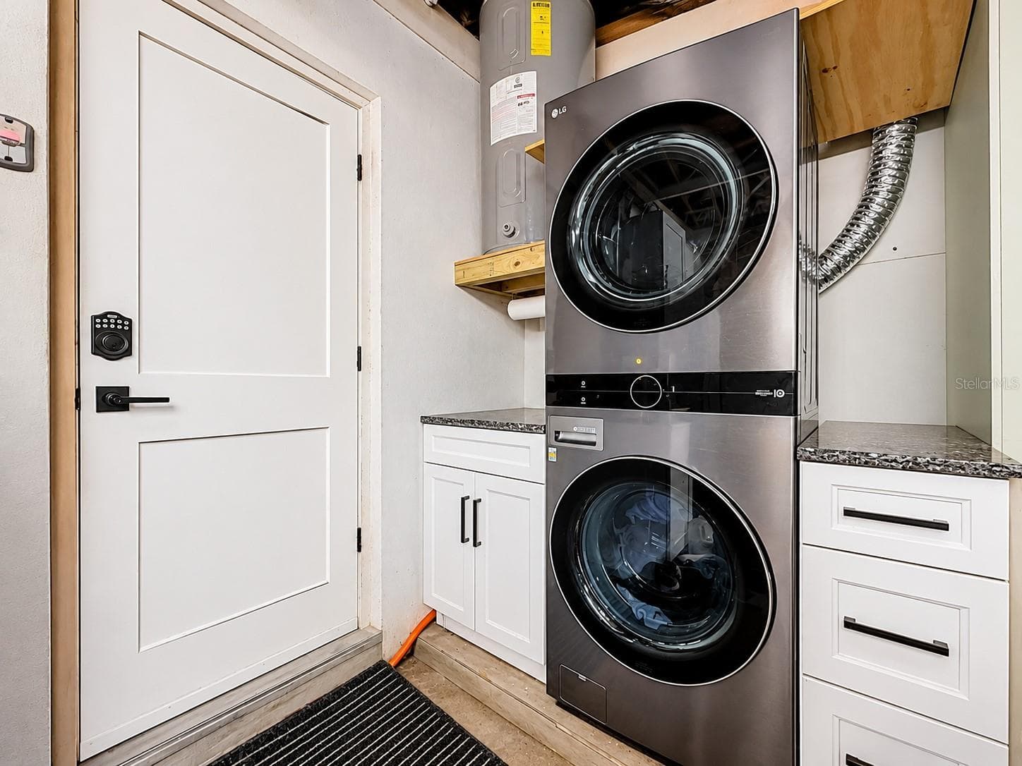 Washer and dryer in garage - 1509 BARBARA AVE, CLEARWATER