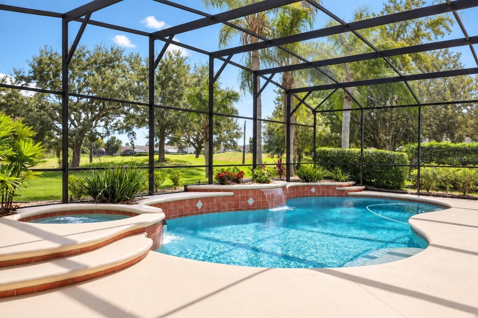 STUNNING SCREEN-ENCLOSED POOL AND EXPANSIVE OUTDOOR LIVING AREA! Enjoy breathtaking views of lush tropical landscaping and peaceful green space with NO REAR NEIGHBORS! The spacious covered lanai overlooks the sparkling pool, creating the perfect setting for morning coffee, entertaining guests, or relaxing while enjoying Florida's beautiful year-round weather. YOUR OWN PRIVATE BACKYARD PARADISE! - 14542 RIVIERA POINTE DR, ORLANDO