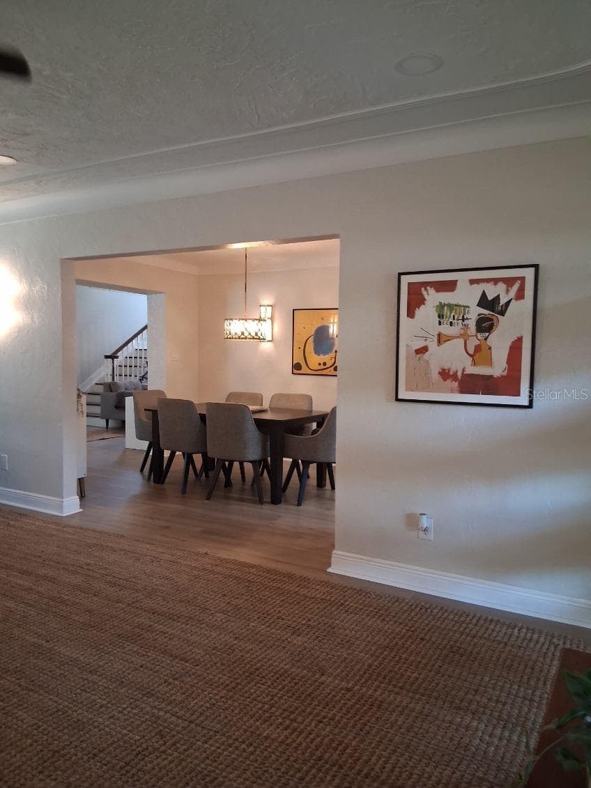 View from Great Room into the Dining Room - 8220 YARDLEY AVE N, ST PETERSBURG
