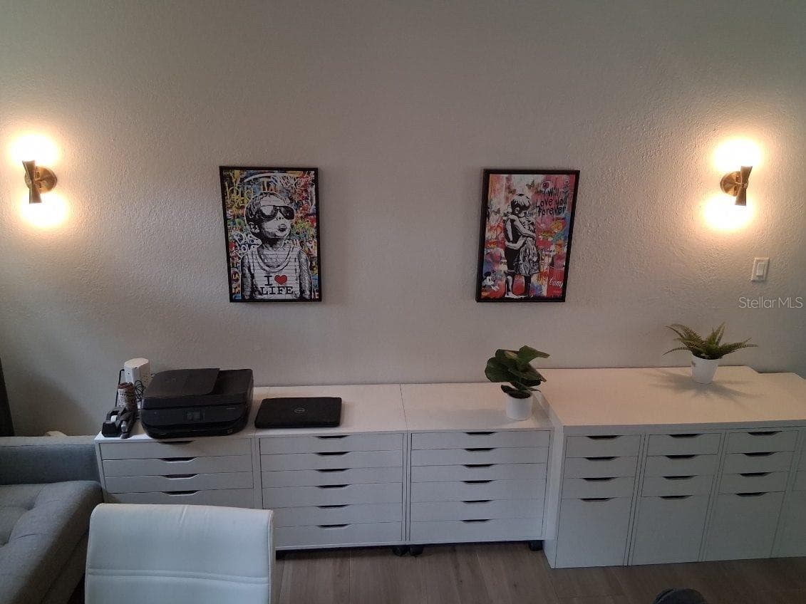Custom gold-tone sconces in Office area - 8220 YARDLEY AVE N, ST PETERSBURG