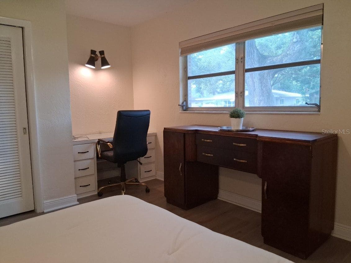 Thoughtful built-in desk in the second bedroom--a great use of space - 8220 YARDLEY AVE N, ST PETERSBURG