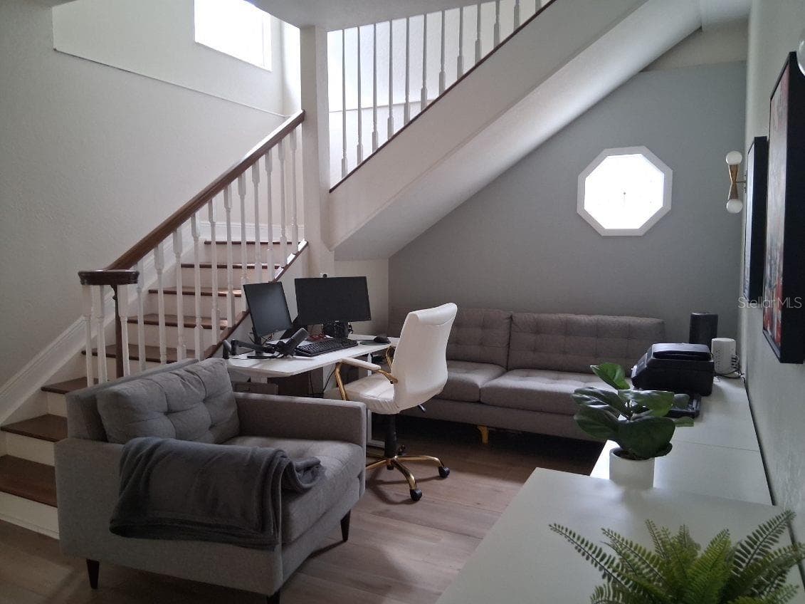 Stairs to the second floor, and large flex space used as an Office - 8220 YARDLEY AVE N, ST PETERSBURG