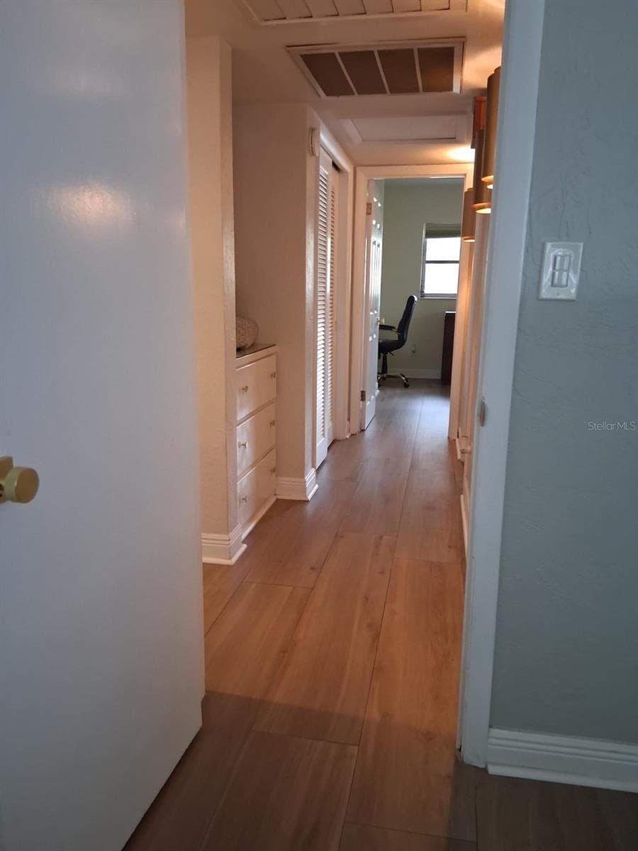 Another view of the upstairs hallway - 8220 YARDLEY AVE N, ST PETERSBURG