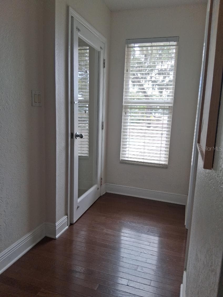 At the top of the stairs, there is a door for extra privacy and quiet for sleepers - 8220 YARDLEY AVE N, ST PETERSBURG