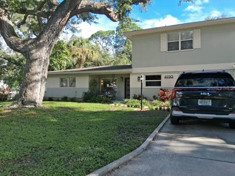 This coach light has been maintained and still works! - 8220 YARDLEY AVE N, ST PETERSBURG