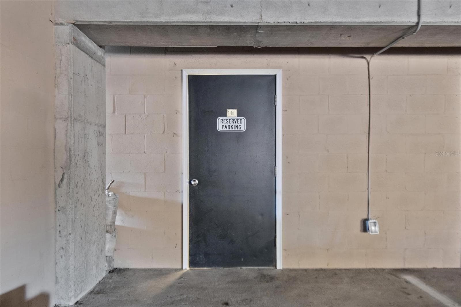 assigned parking with storage room - 300 BELLA HARBOR CT #101, PALM COAST