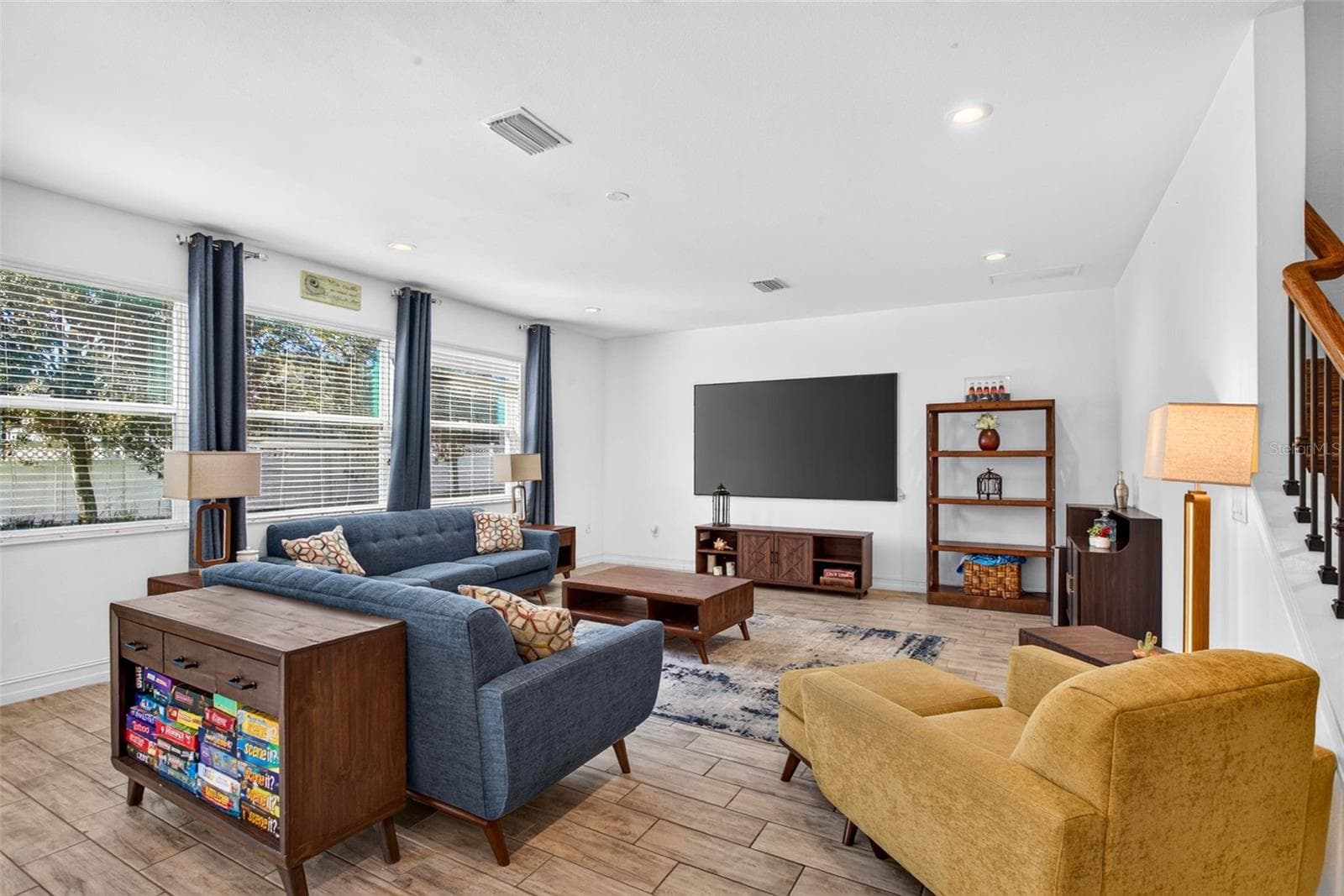Living room with giant windows for full daytime natural light - 33455 AZALEA RIDGE DR, WESLEY CHAPEL