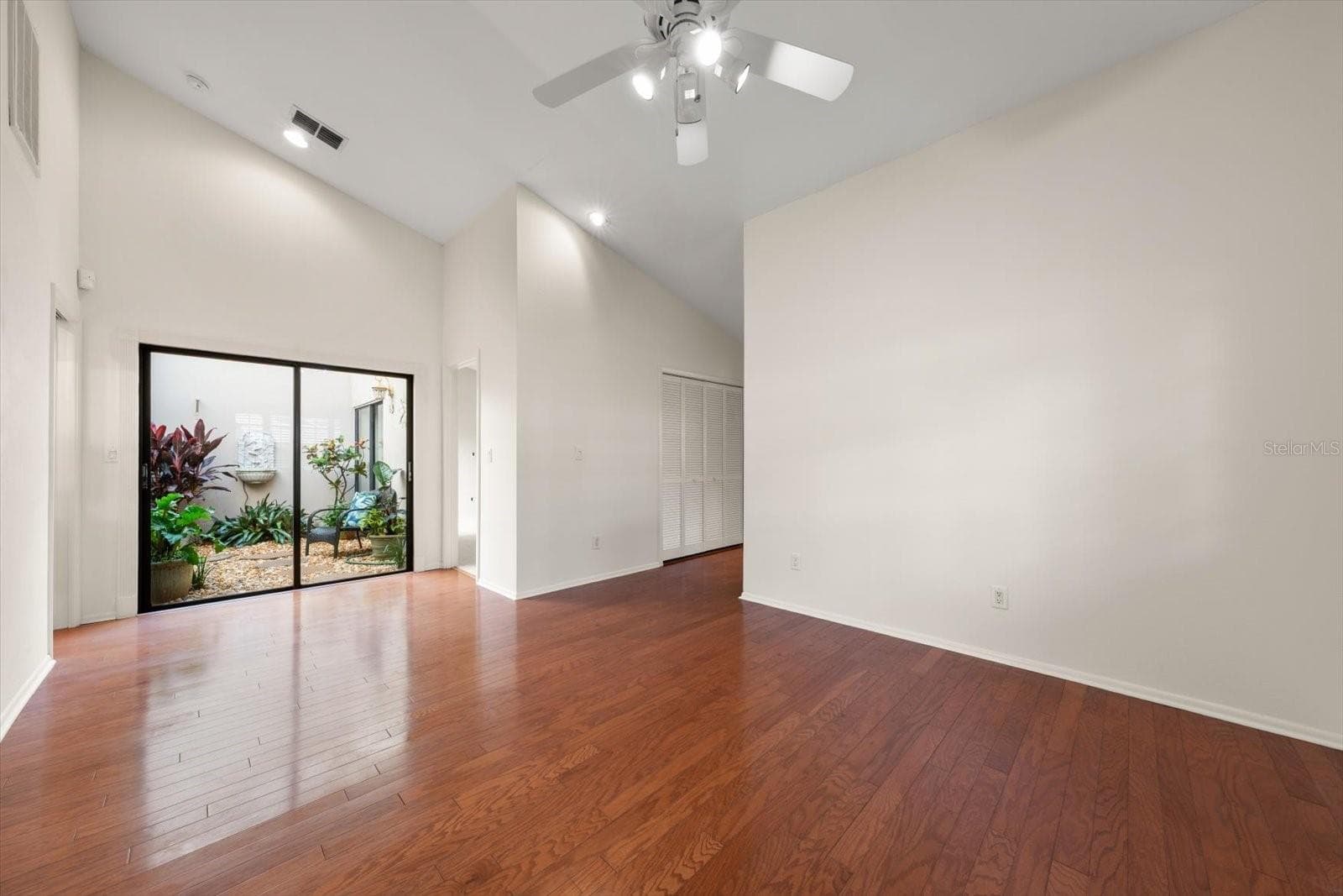 view from dining room out to atrium - 3160 JADEMOOR CIR, PALM HARBOR