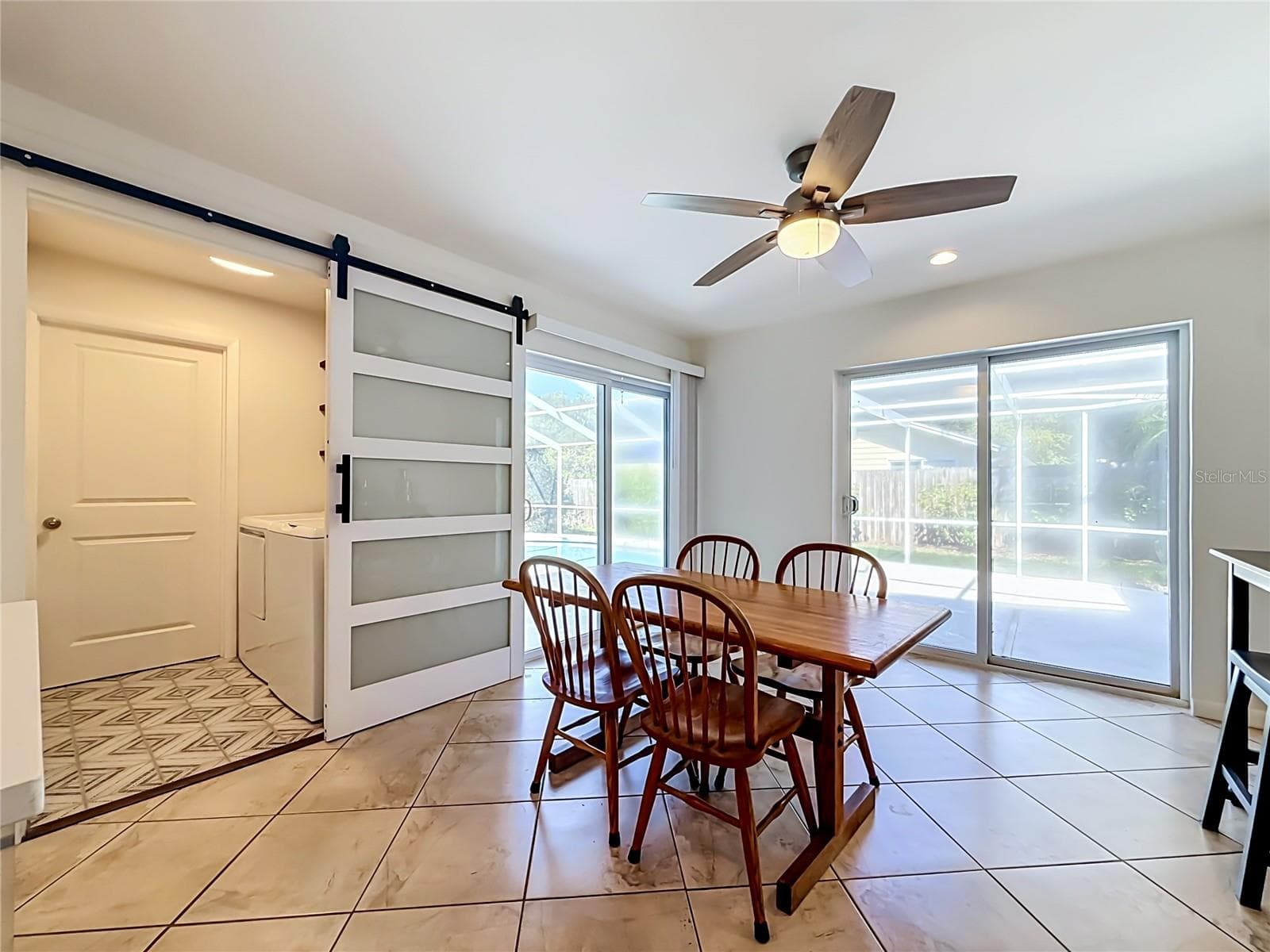 Dining Room - Outdoor Living and Pool Area - Laundry Room - 1852 SOURWOOD BLVD, DUNEDIN