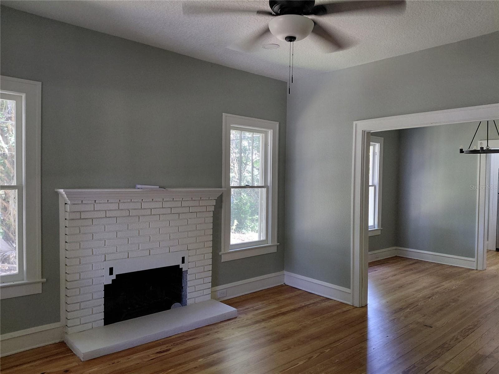Living room 2 with view of dining room - 532 E RICH AVE, DELAND