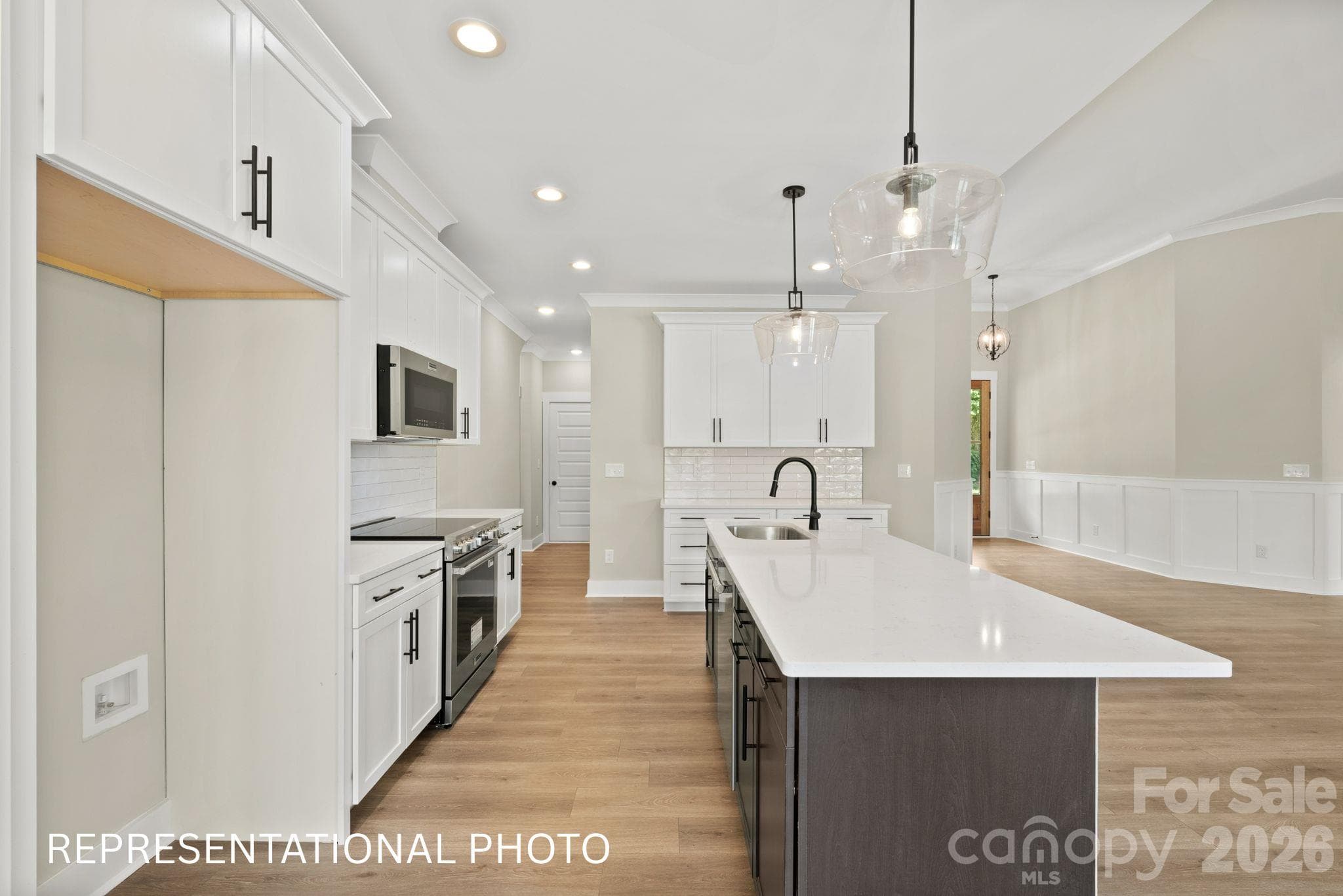 Kitchen and Hallway to Laundry Room - 1052 Baylor Grove Road, Monroe