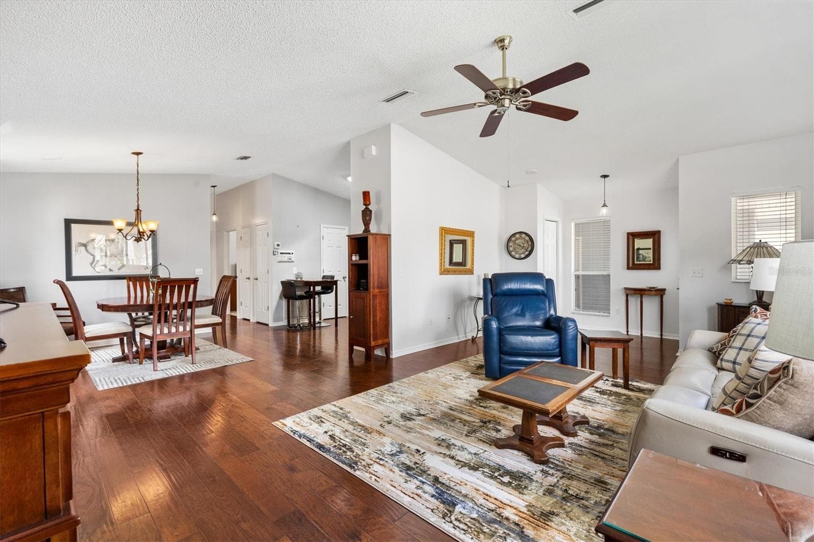 Living Room and Dining Room - 406 DEL MAR DR, LADY LAKE