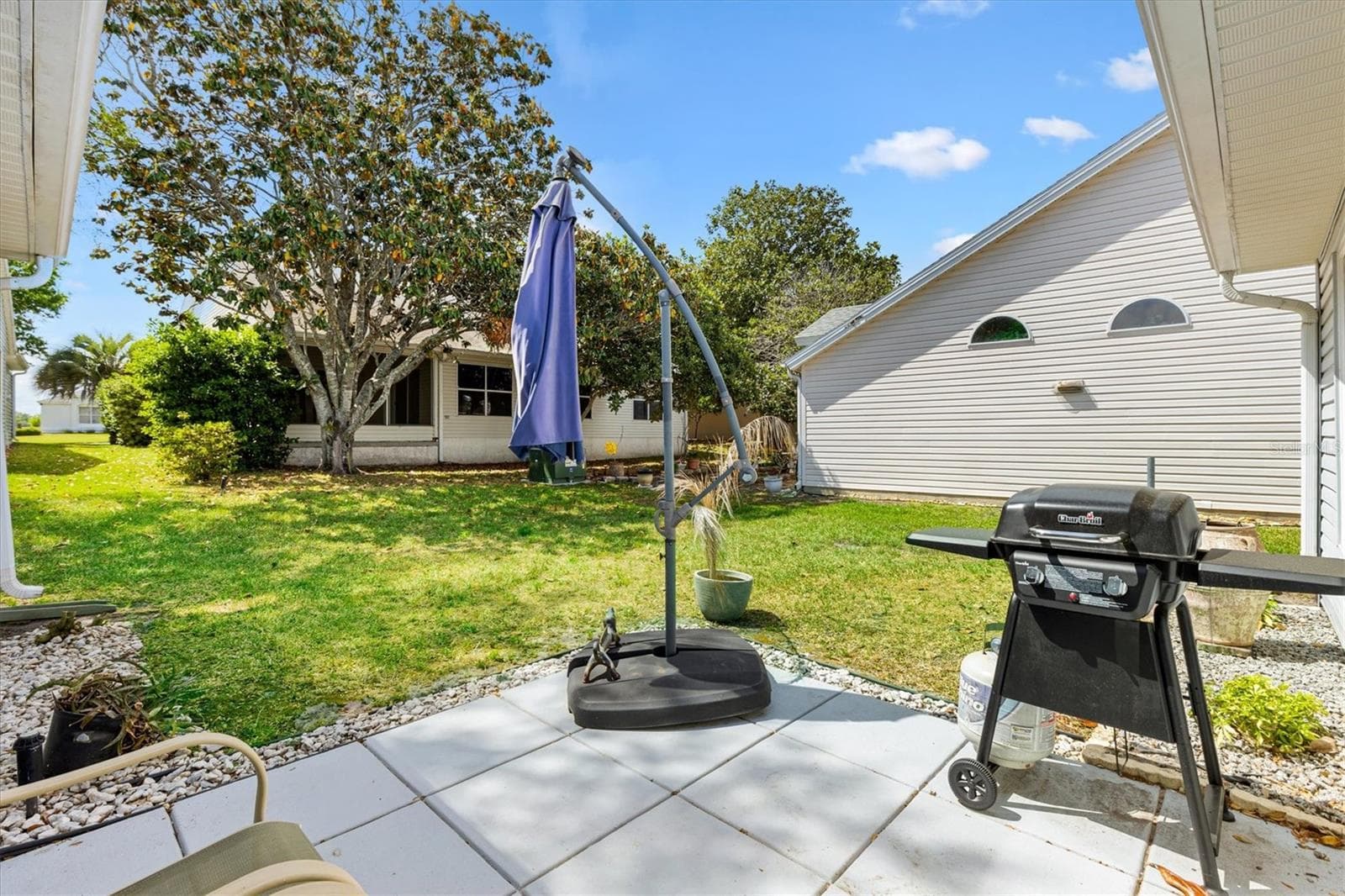 Back Grilling Patio - 406 DEL MAR DR, LADY LAKE