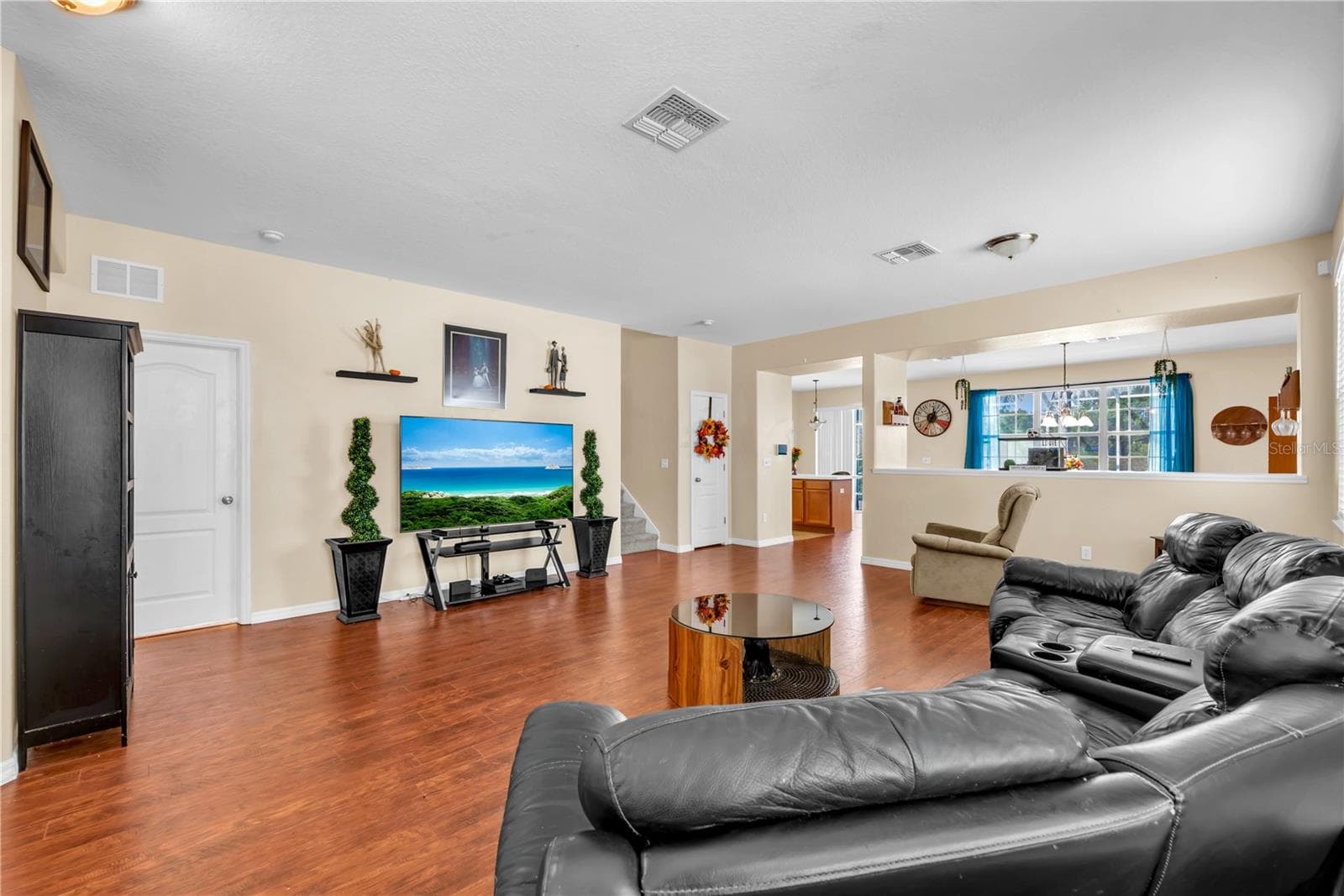From the moment you step inside, you'll appreciate the expansive, open-concept design that makes this home as functional as it is inviting. - 18801 SUNTERRA DR, LAND O LAKES