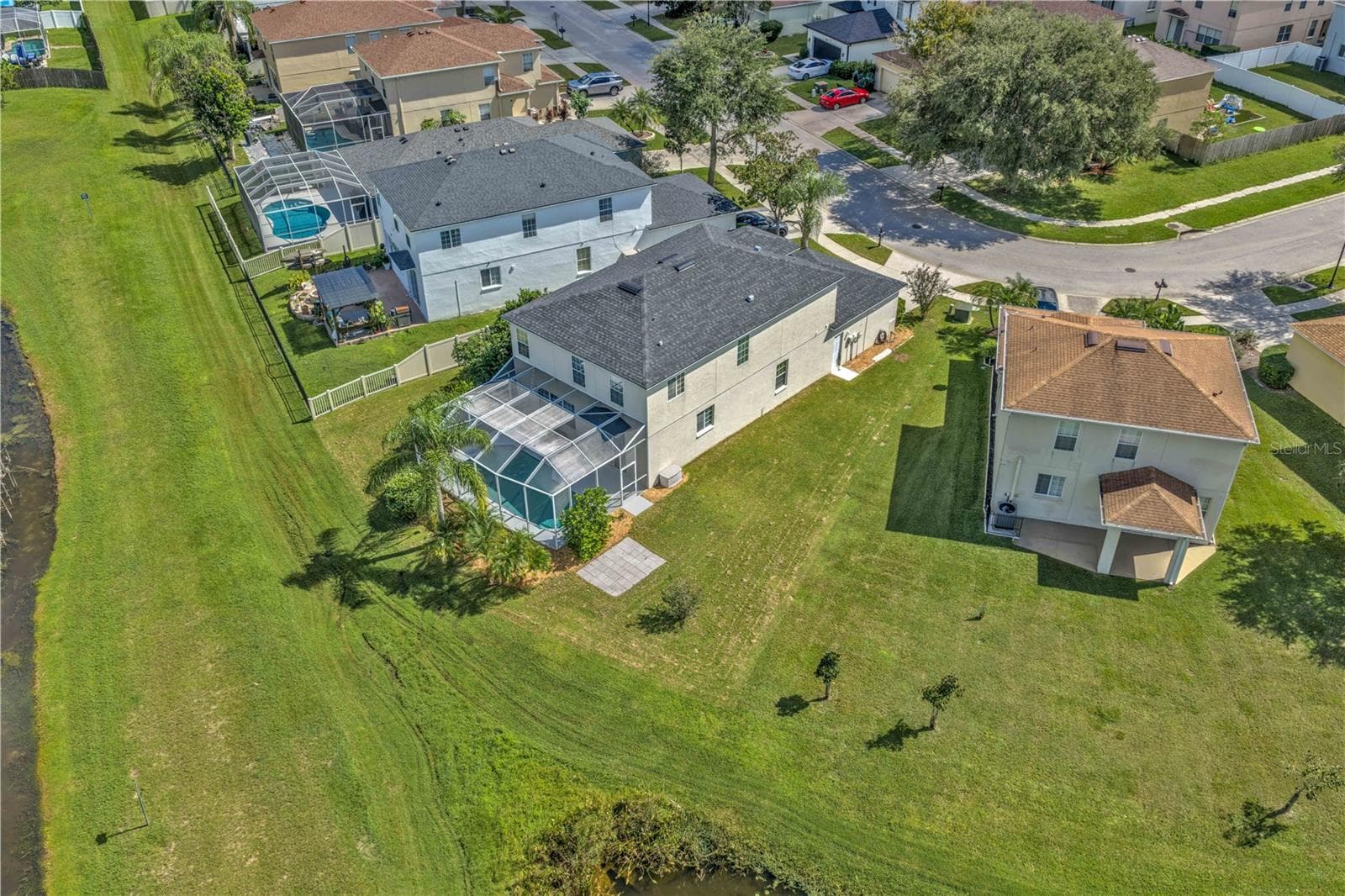 Aerial view of neighboring lots - 18801 SUNTERRA DR, LAND O LAKES