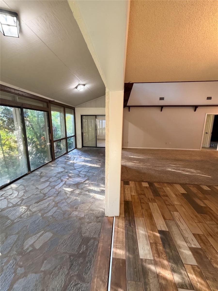 Combo View Of Sunroom, Living Room, Dining Area - 14714 OAK VINE DR, LUTZ