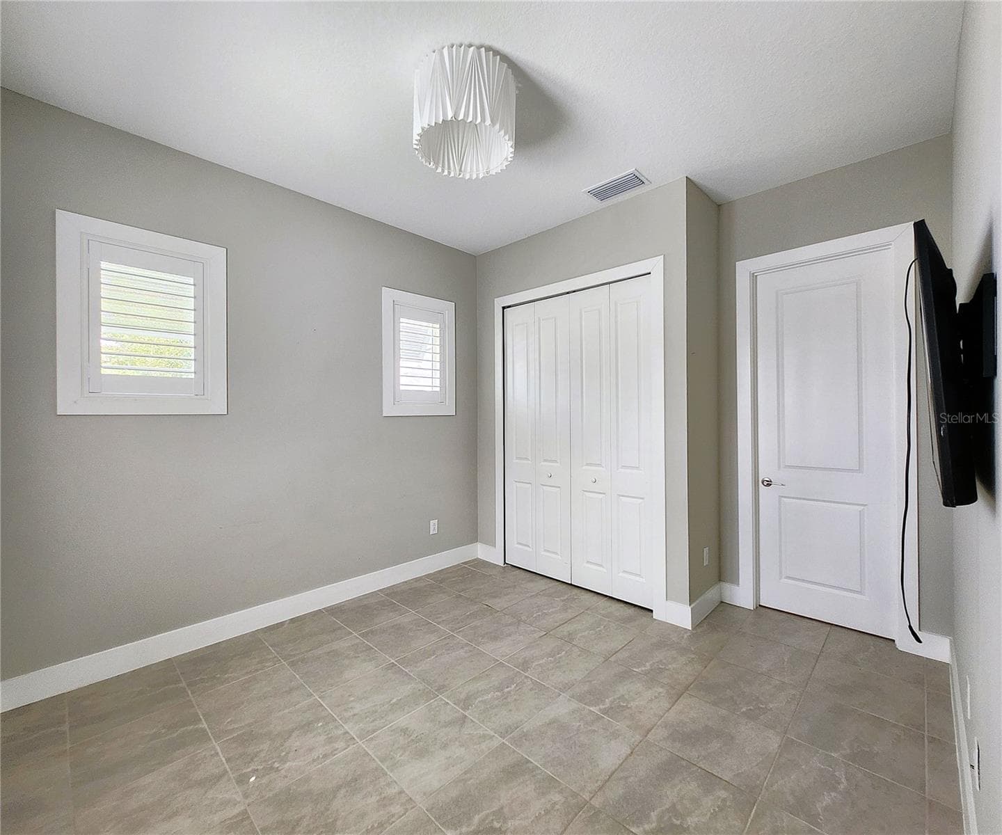 Guest House measures approximately 20x23, includes 1 bedroom, 1 full bathroom, living room, impact glass sliders with remote controlled shades. - 8896 DRUMMER PLANK DR, WESLEY CHAPEL