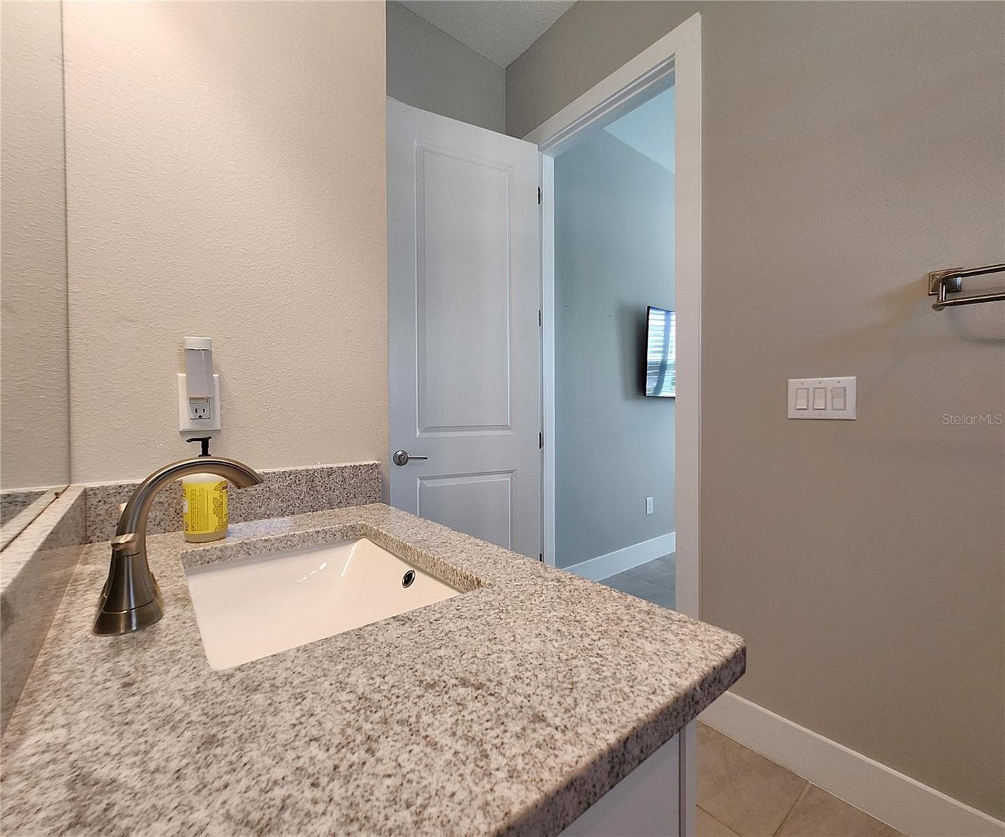 Guest House measures approximately 20x23, includes 1 bedroom, 1 full bathroom, living room, impact glass sliders with remote controlled shades. - 8896 DRUMMER PLANK DR, WESLEY CHAPEL