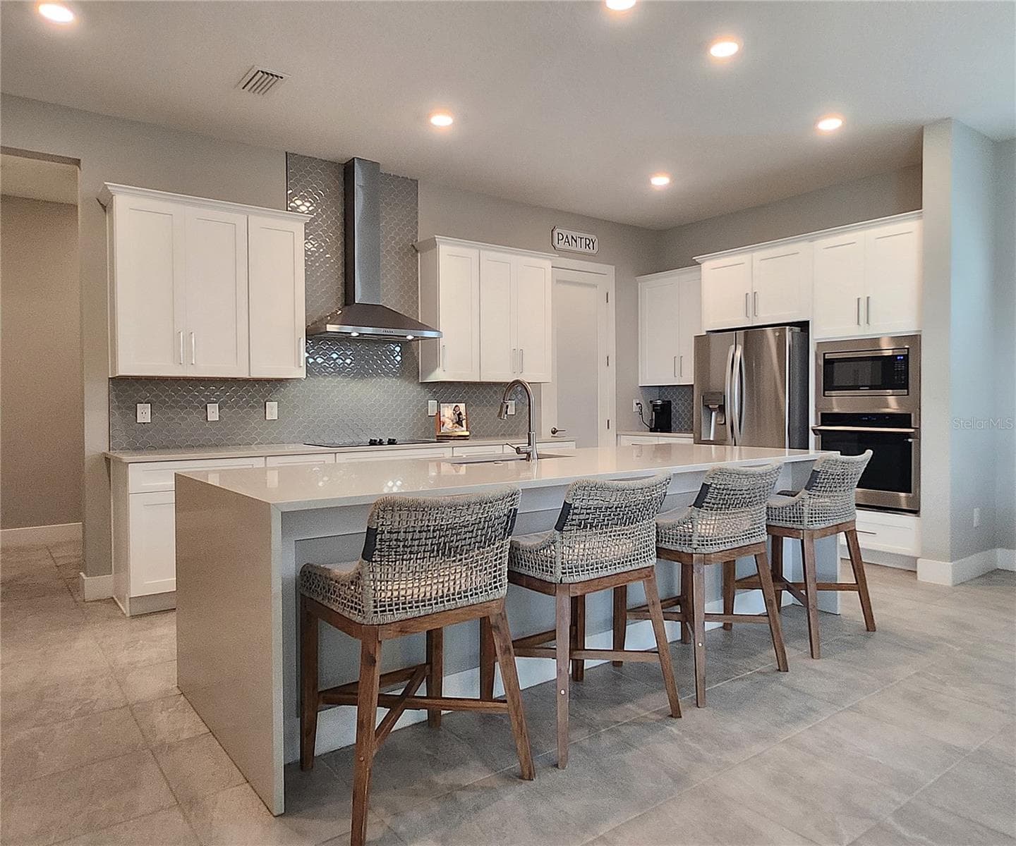 Quartz countertops, external vent - 8896 DRUMMER PLANK DR, WESLEY CHAPEL