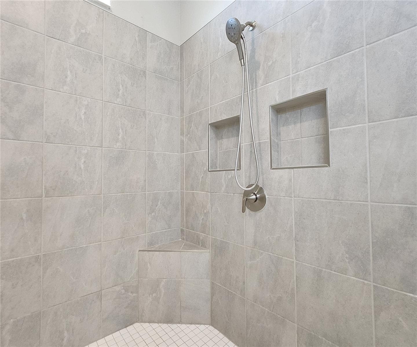 Master bathroom includes large walk-in tiled shower, water closet, walk-in closet, dual sink vanity, granite countertops - 8896 DRUMMER PLANK DR, WESLEY CHAPEL