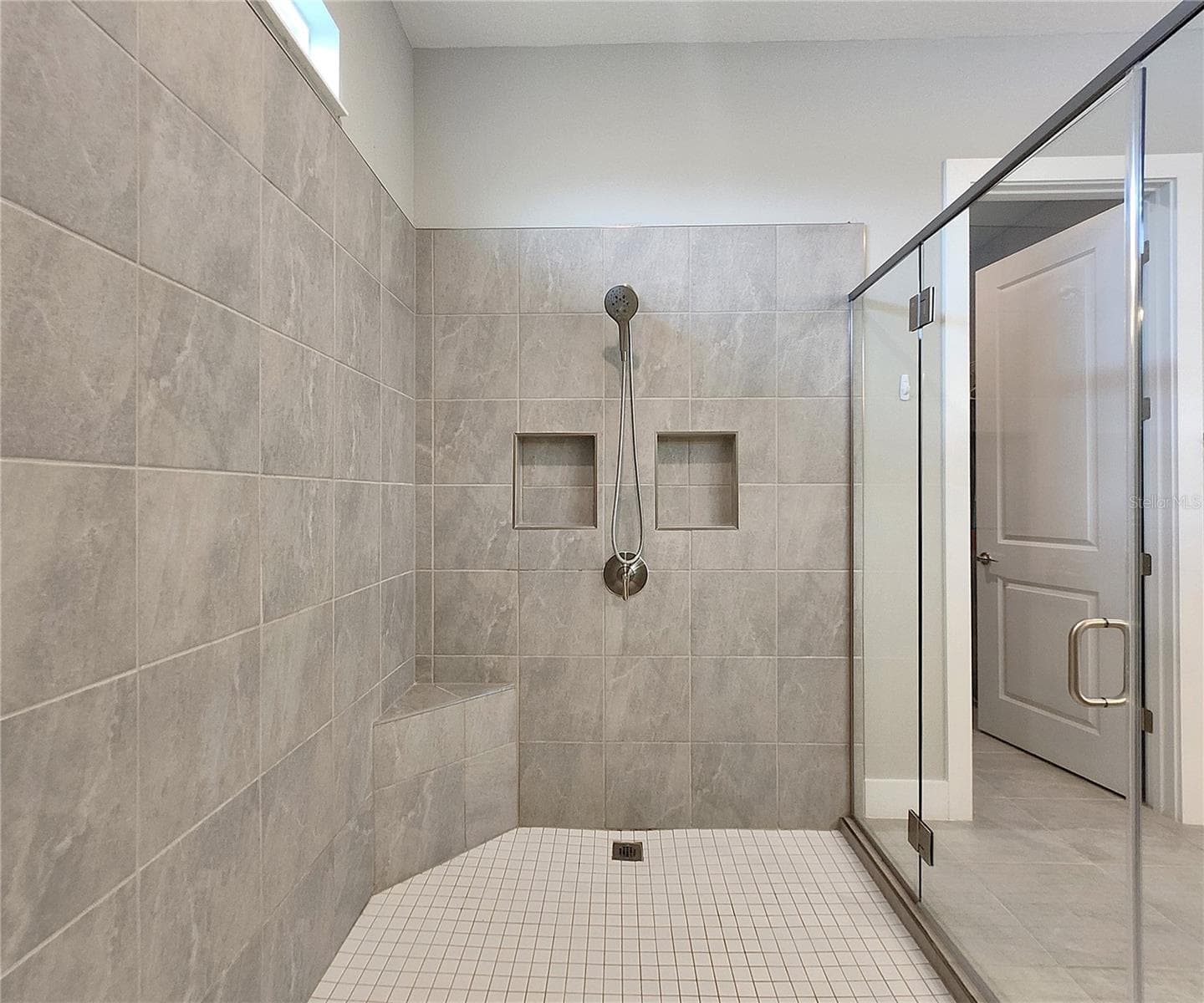 Master bathroom includes large walk-in tiled shower, water closet, walk-in closet, dual sink vanity, granite countertops - 8896 DRUMMER PLANK DR, WESLEY CHAPEL