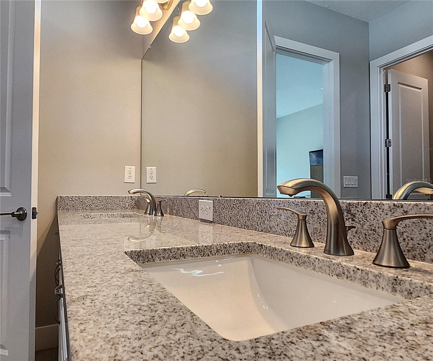 Master bathroom includes large walk-in tiled shower, water closet, walk-in closet, dual sink vanity, granite countertops - 8896 DRUMMER PLANK DR, WESLEY CHAPEL