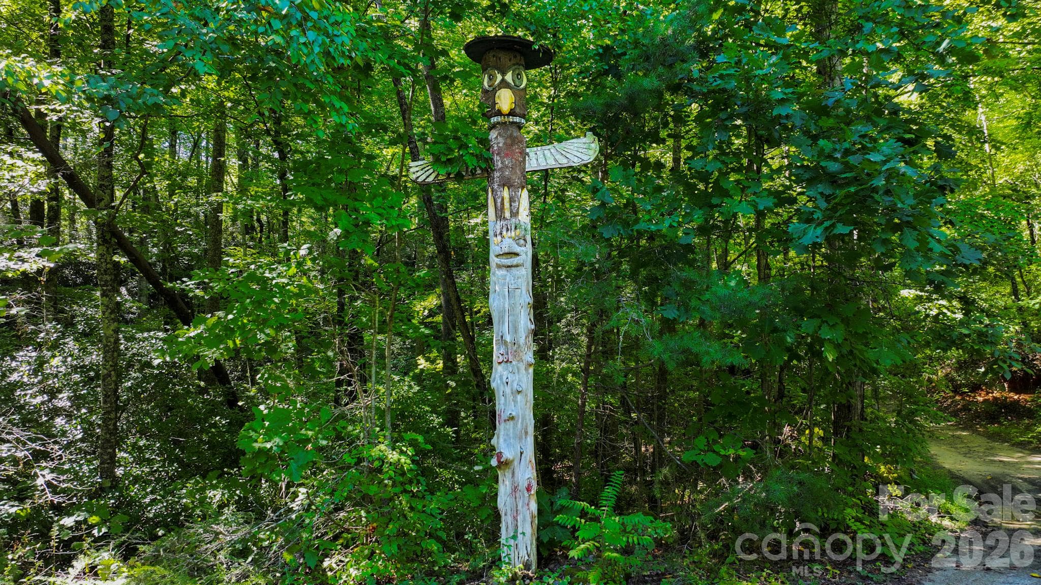 Hand Carved Cedar Totem Pole - 171 Camp Elliott Road, Black Mountain
