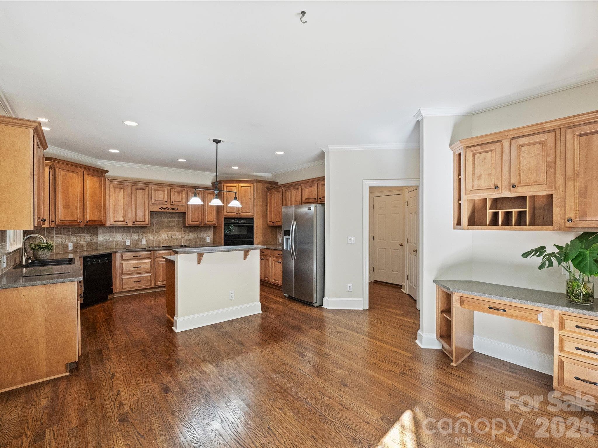 Kitchen open to the great room - 7705 Stonehaven Drive, Waxhaw