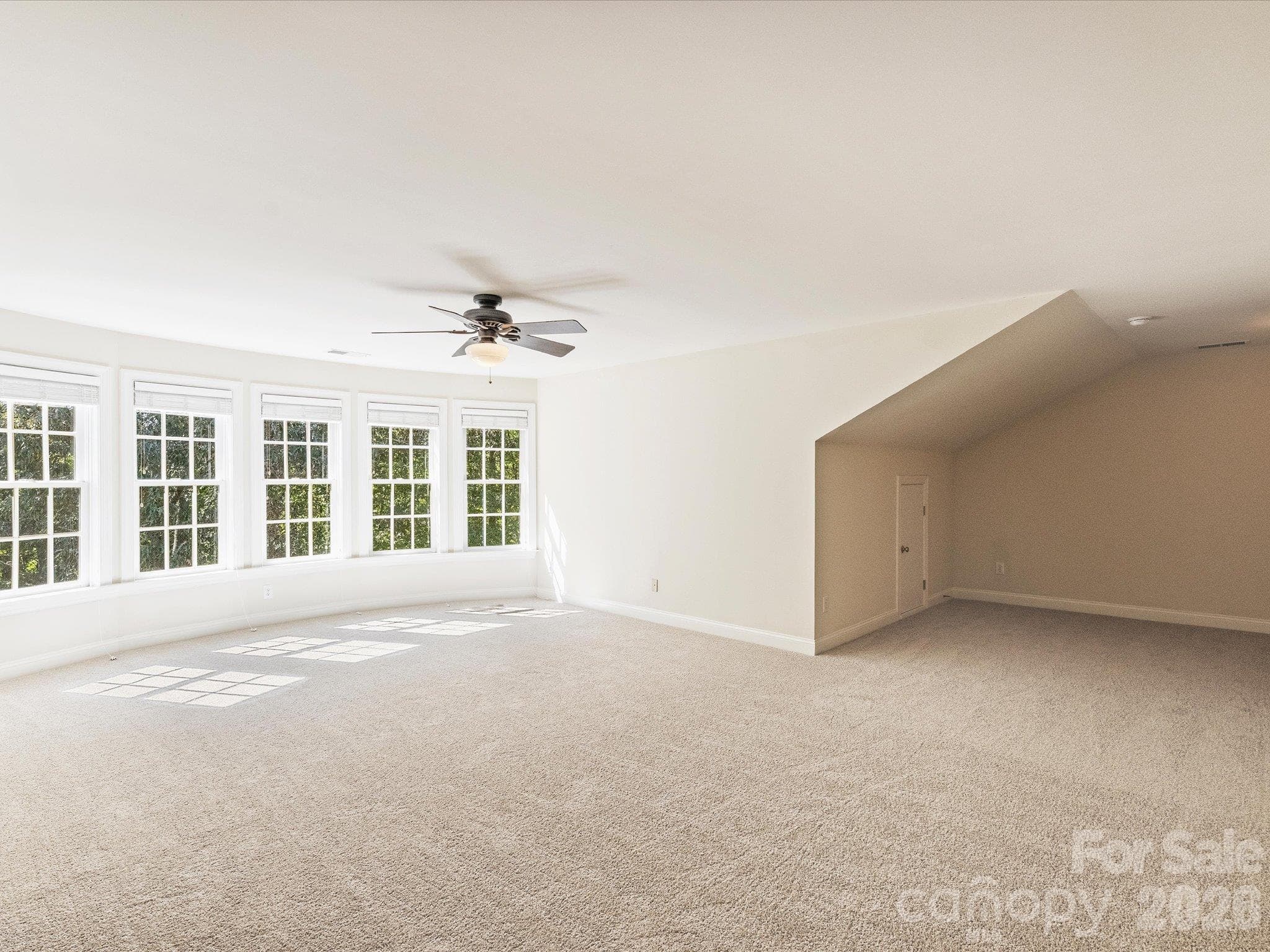 Third floor has wall of windows with room for full bedroom - 7705 Stonehaven Drive, Waxhaw