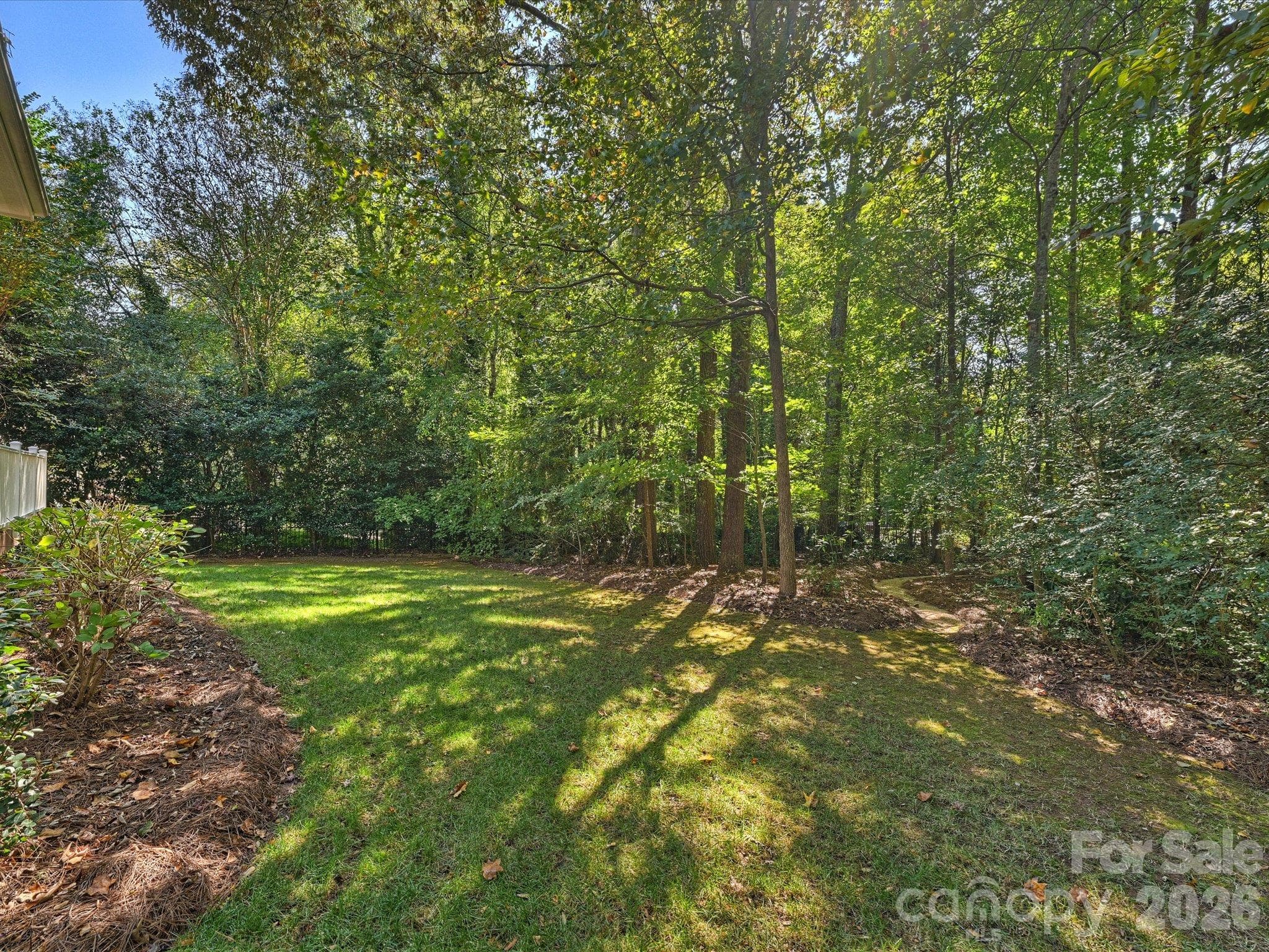 Wooded lot offers beautiful seasonal views - 7705 Stonehaven Drive, Waxhaw