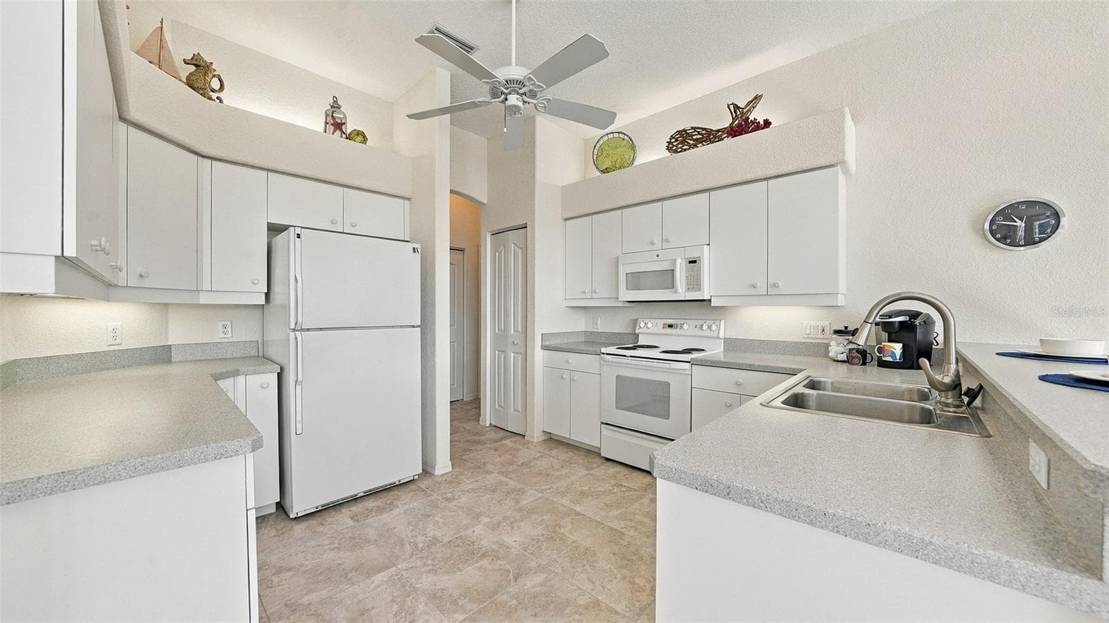 miles of counter space - 12 MEDALIST CT, ROTONDA WEST
