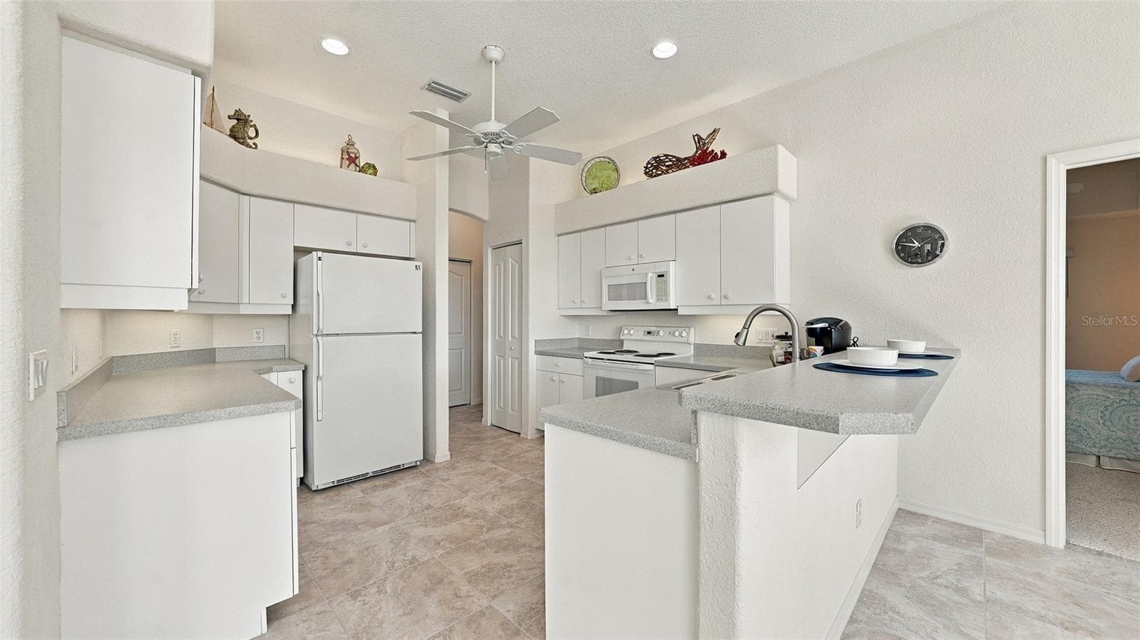 lots of cabinets - 12 MEDALIST CT, ROTONDA WEST