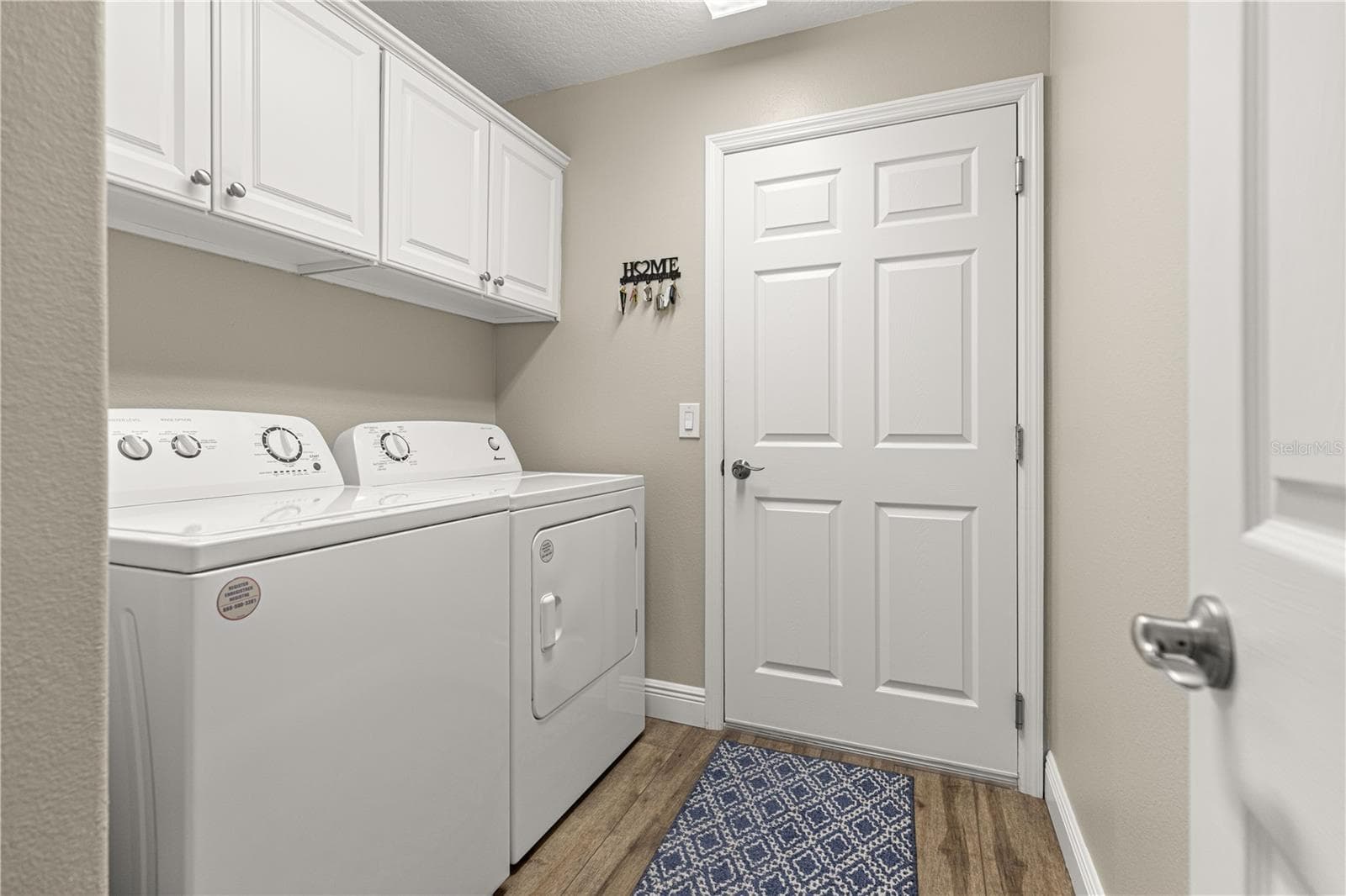 Laundry room/with cabinets - 3562 YATES AVE, THE VILLAGES