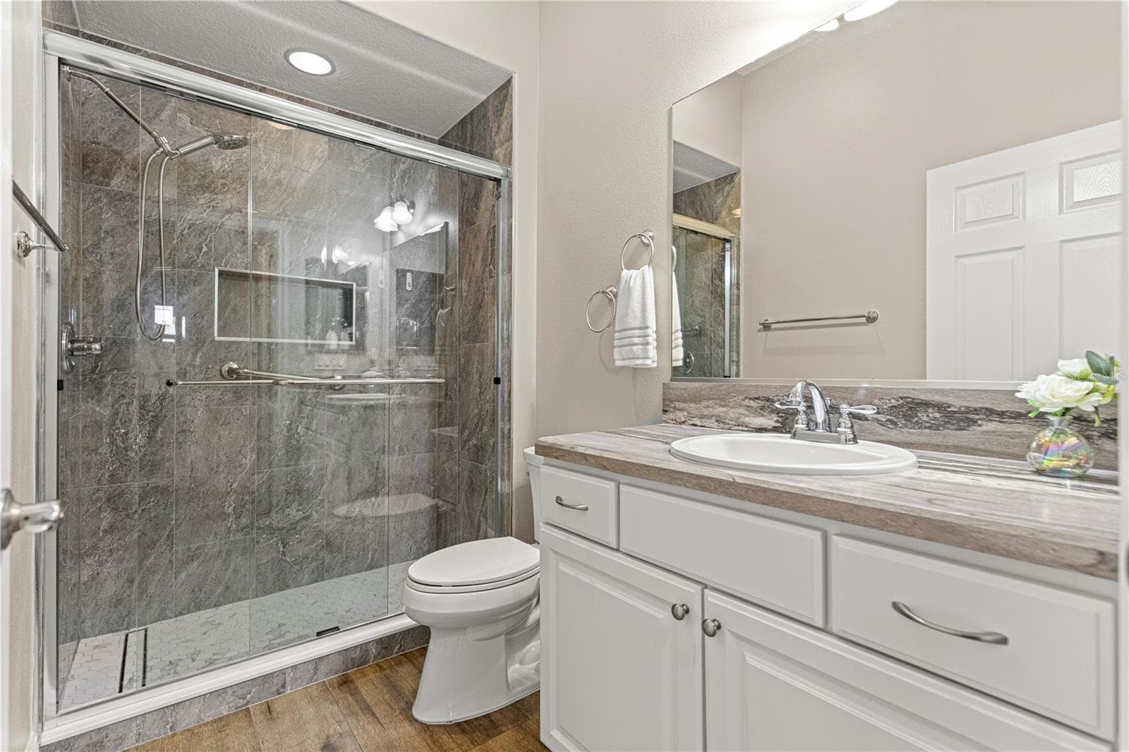 New quest shower, tiled with a beautiful glass enclosure - 3562 YATES AVE, THE VILLAGES