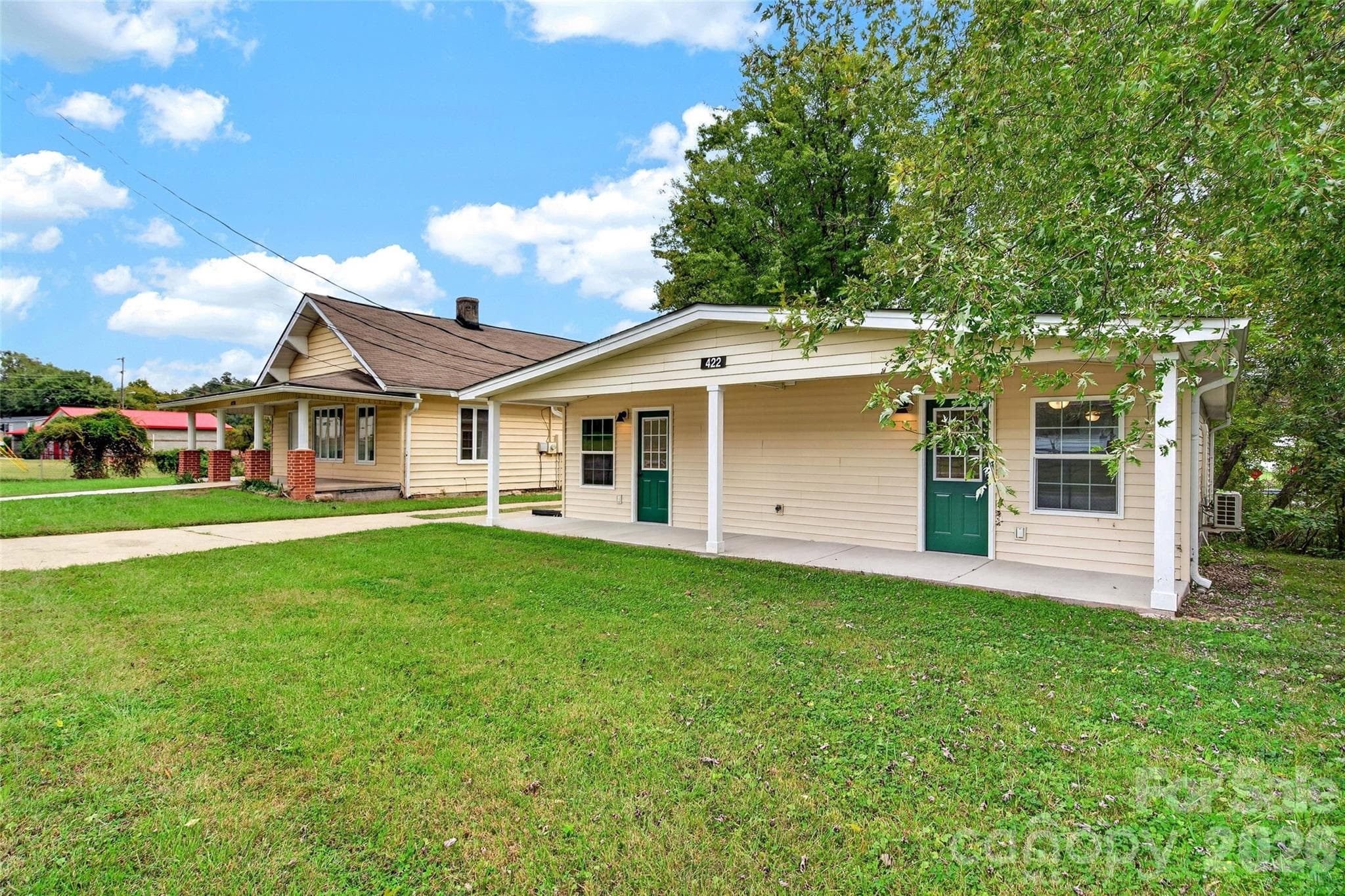 Yard of duplex. - 432 & 422 E Main Street, Old Fort