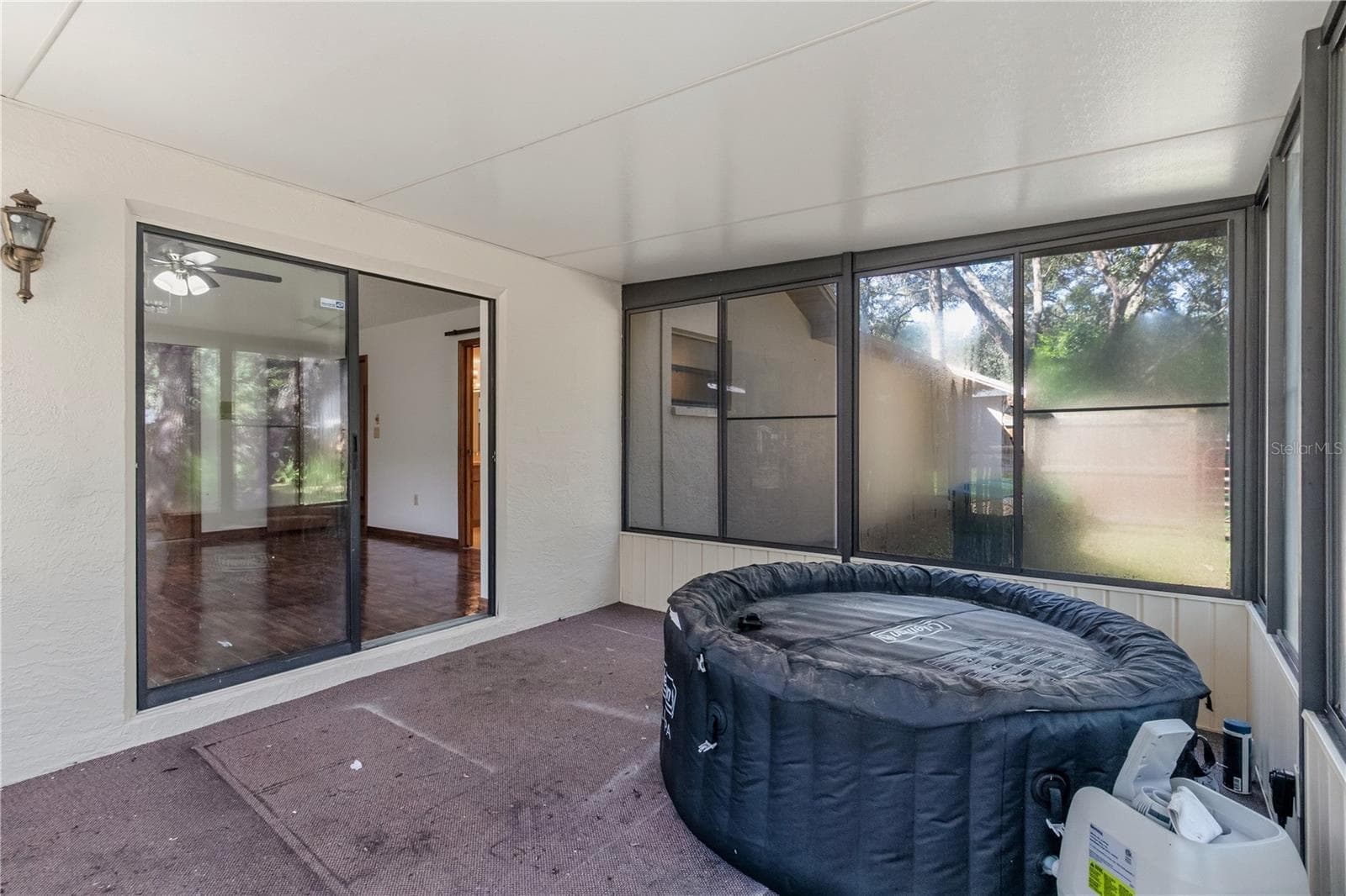 Porch and spa off of Primary Bedroom - 18644 FURMAN DR, SPRING HILL