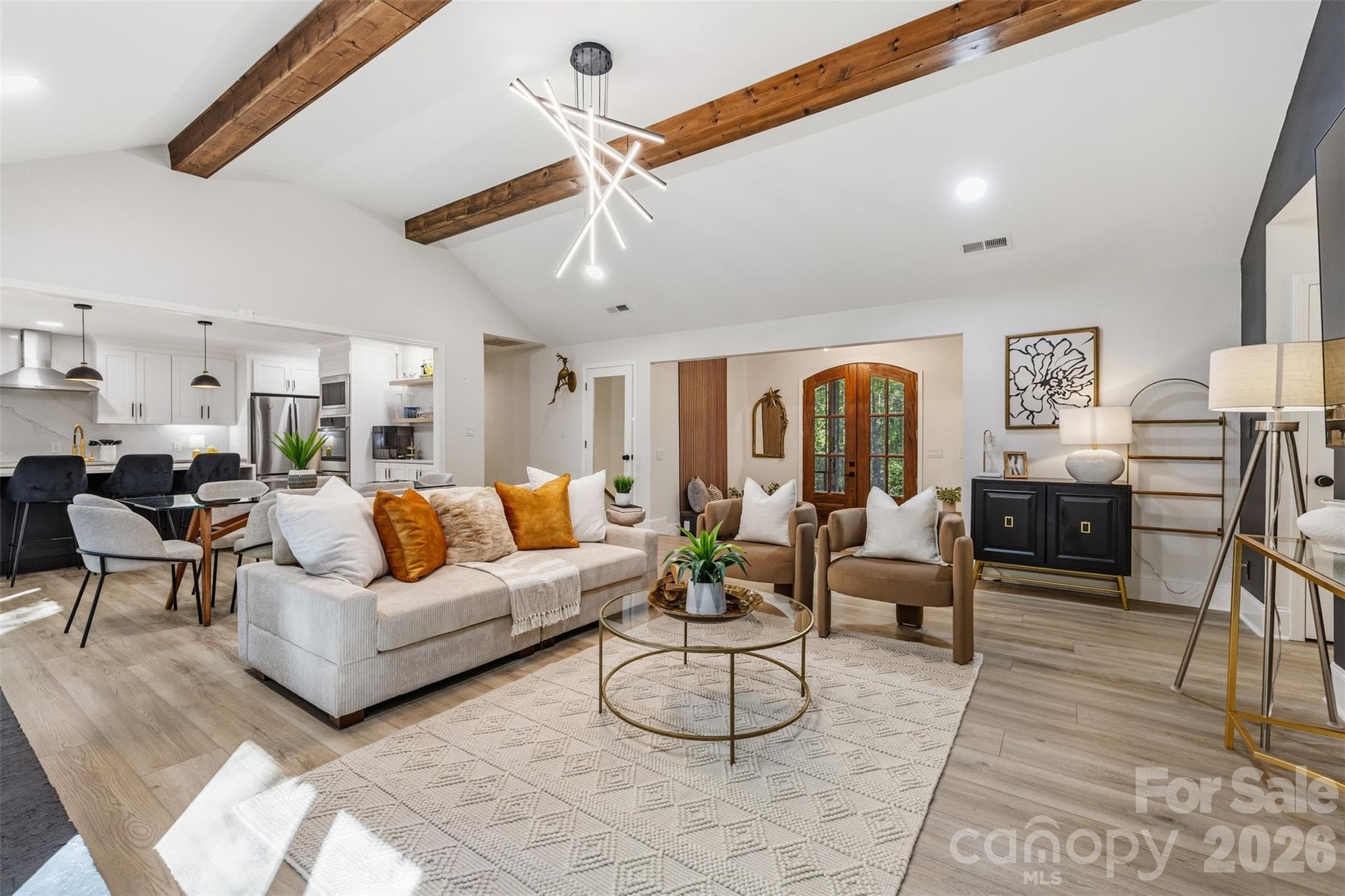 Vaulted ceilings and exposed wood beams highlight this bright, open space - 16 Tanglewood Road, Lake Wylie